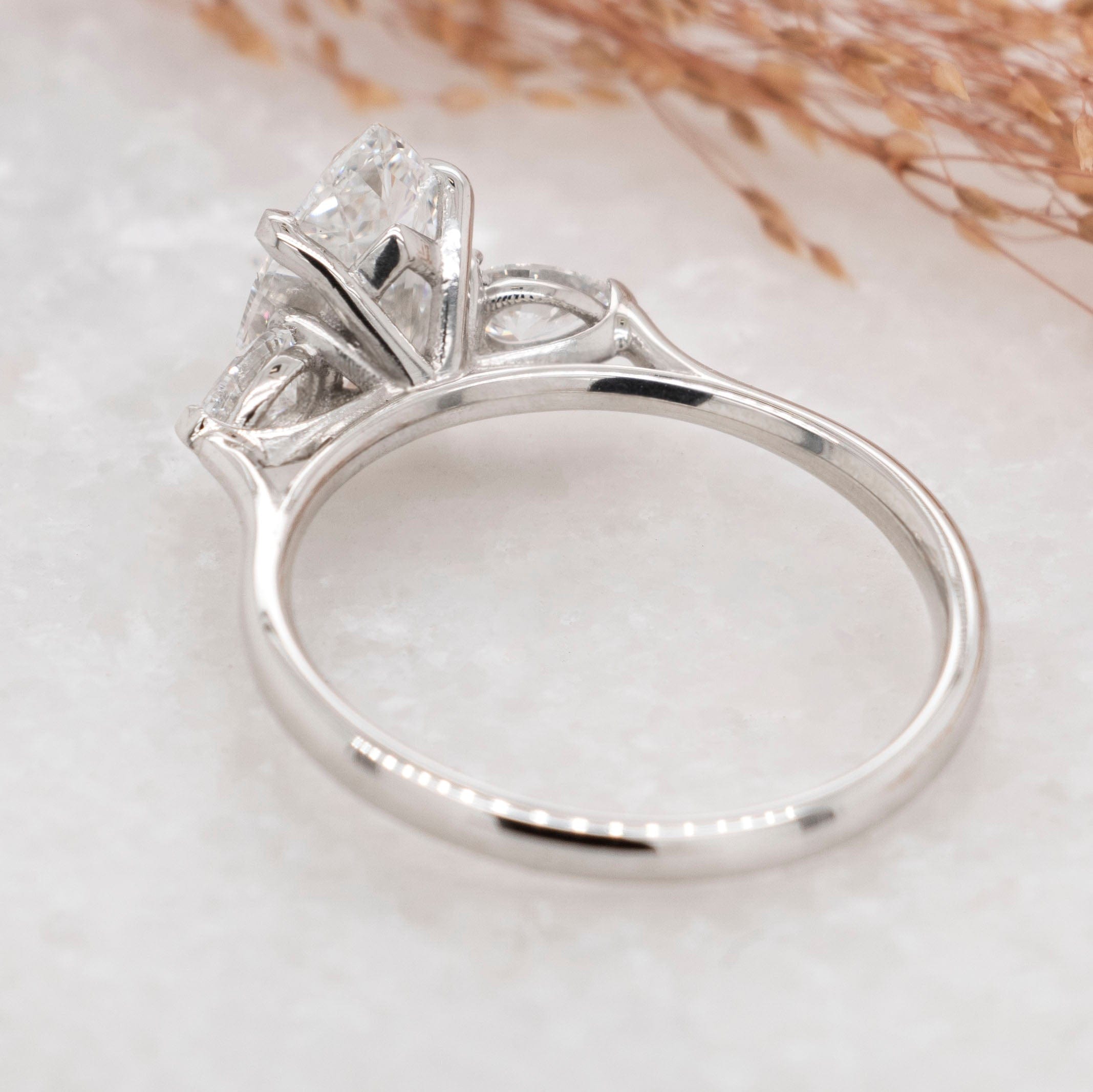 1.50 Carats Pear Shape Moissanite Three Stone Engagement Ring