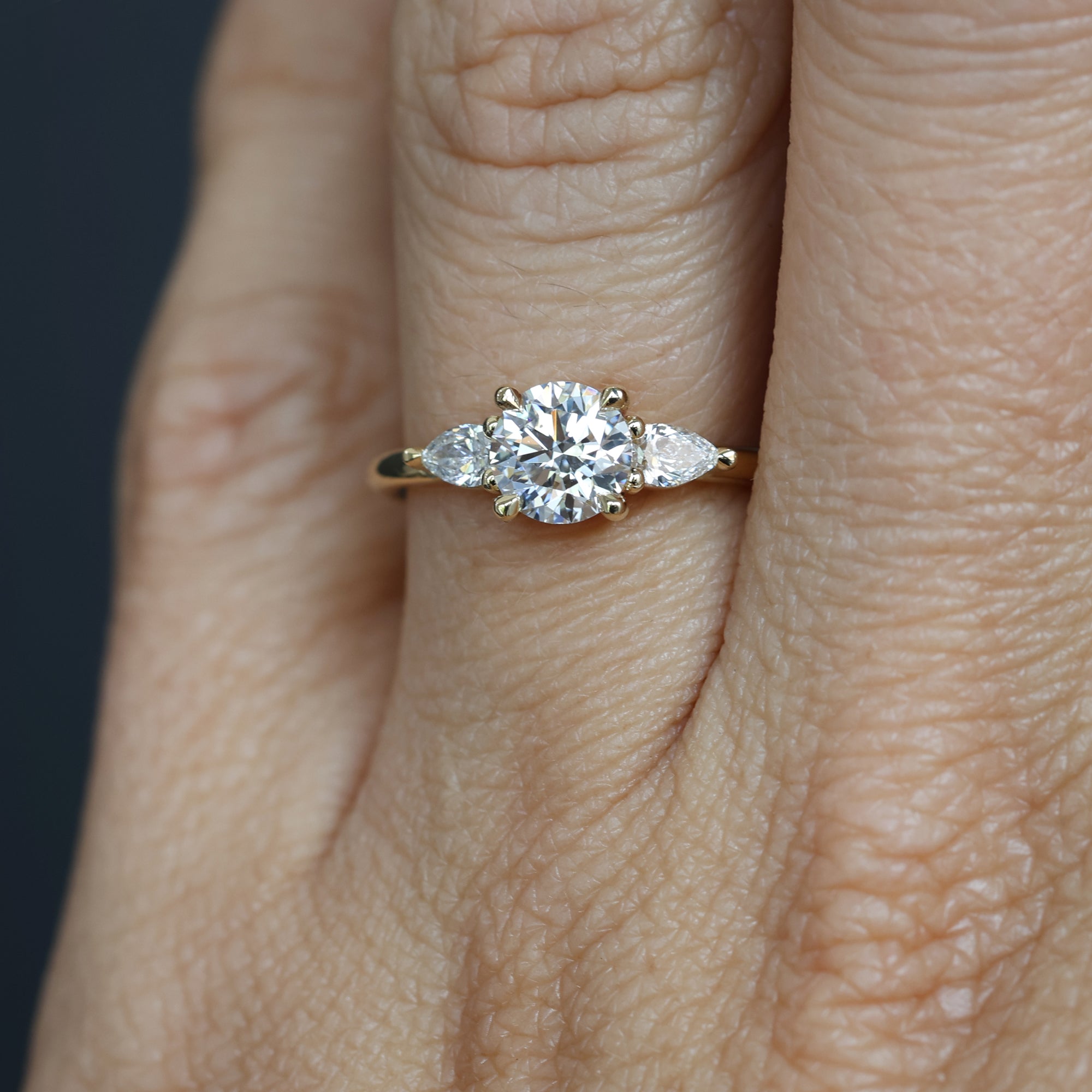 0.84 Carats Round Shape Moissanite Three Stone Engagement Ring