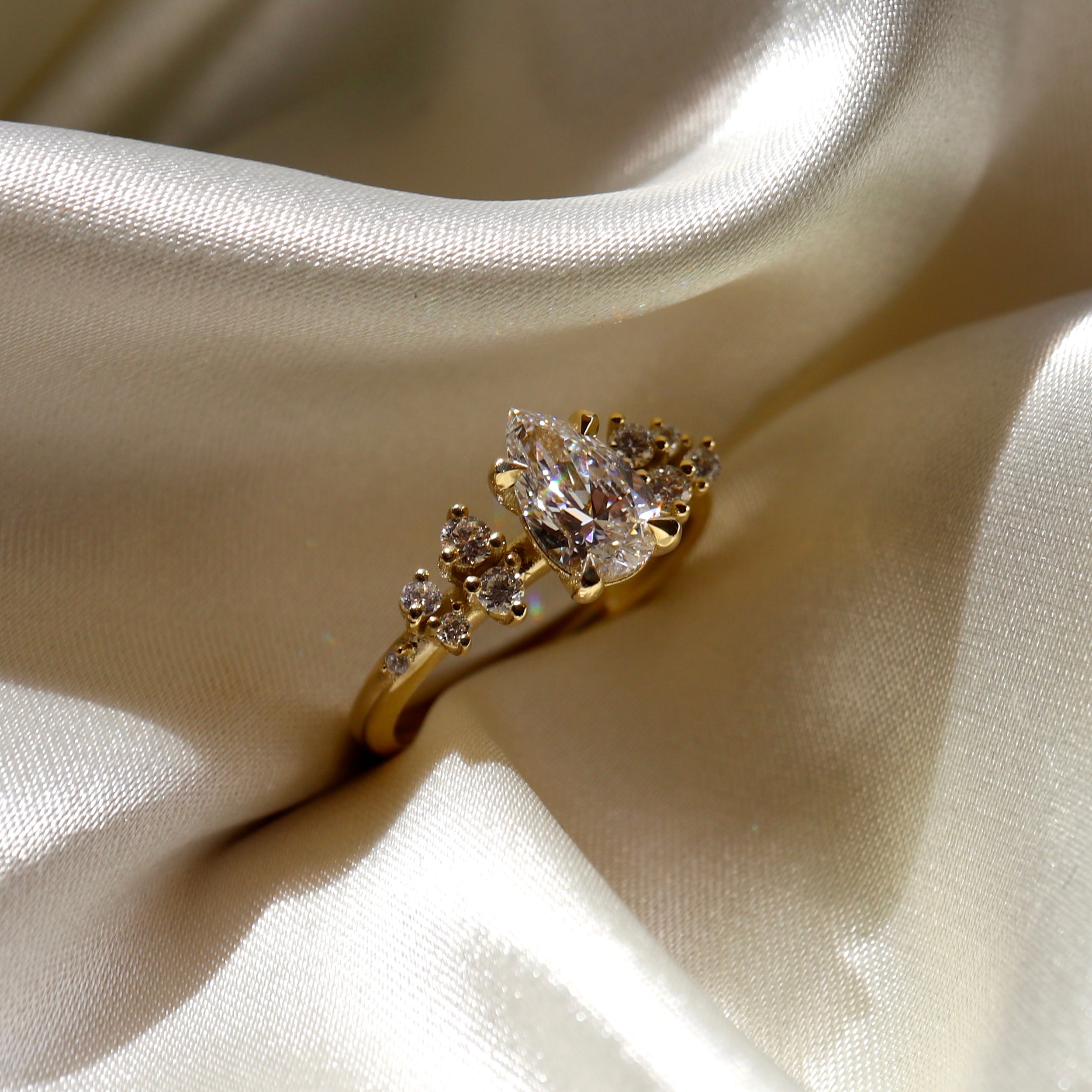 0.70 Carats Pear Shape Moissanite Cluster Engagement Ring