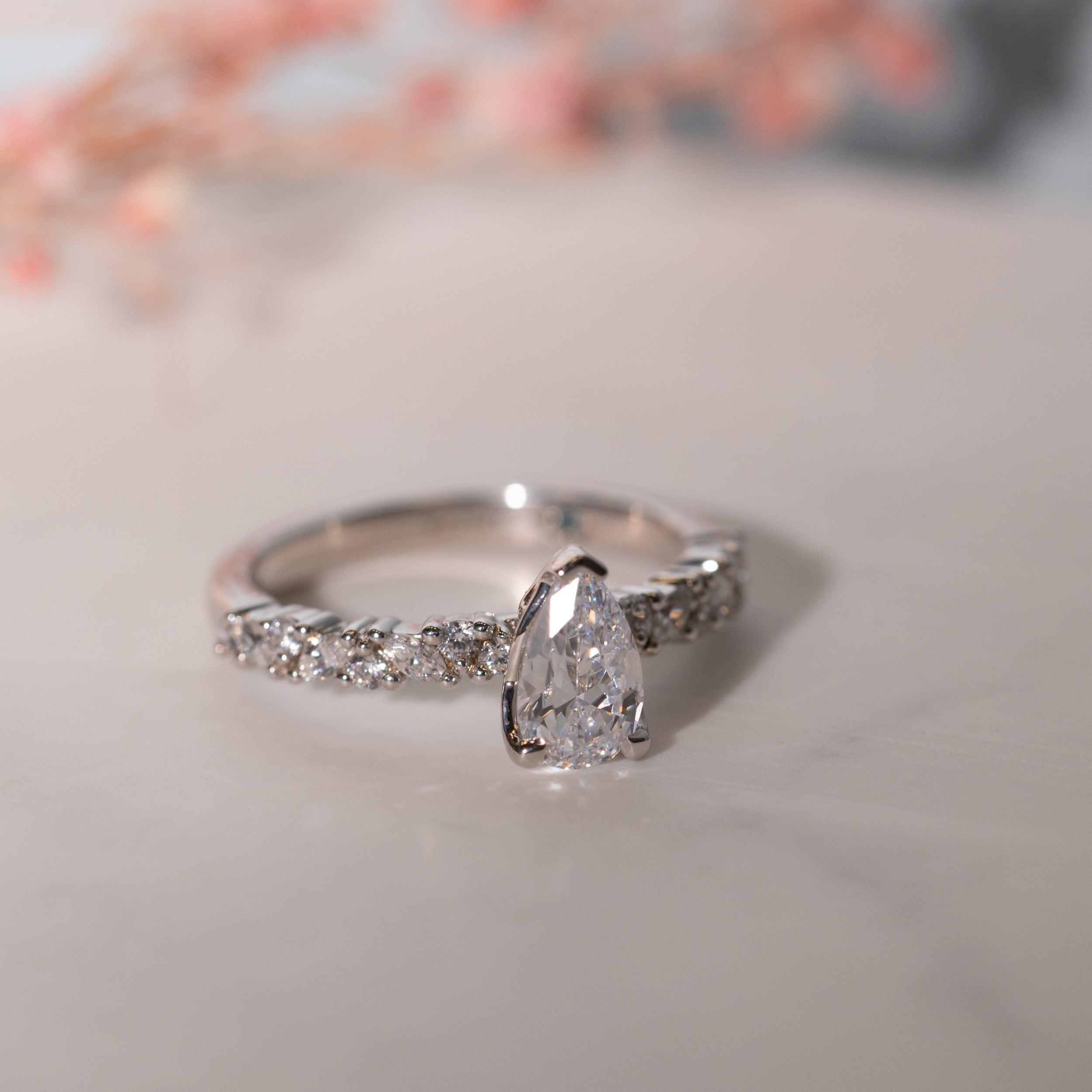 1.09 Carats Pear Shape Moissanite Pave Engagement Ring