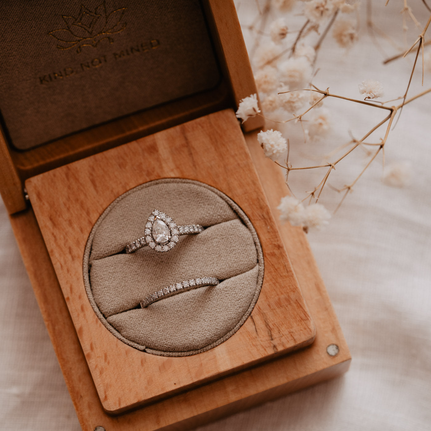 0.95 Carats Pear Shape Moissanite Halo & Pave Engagement Ring