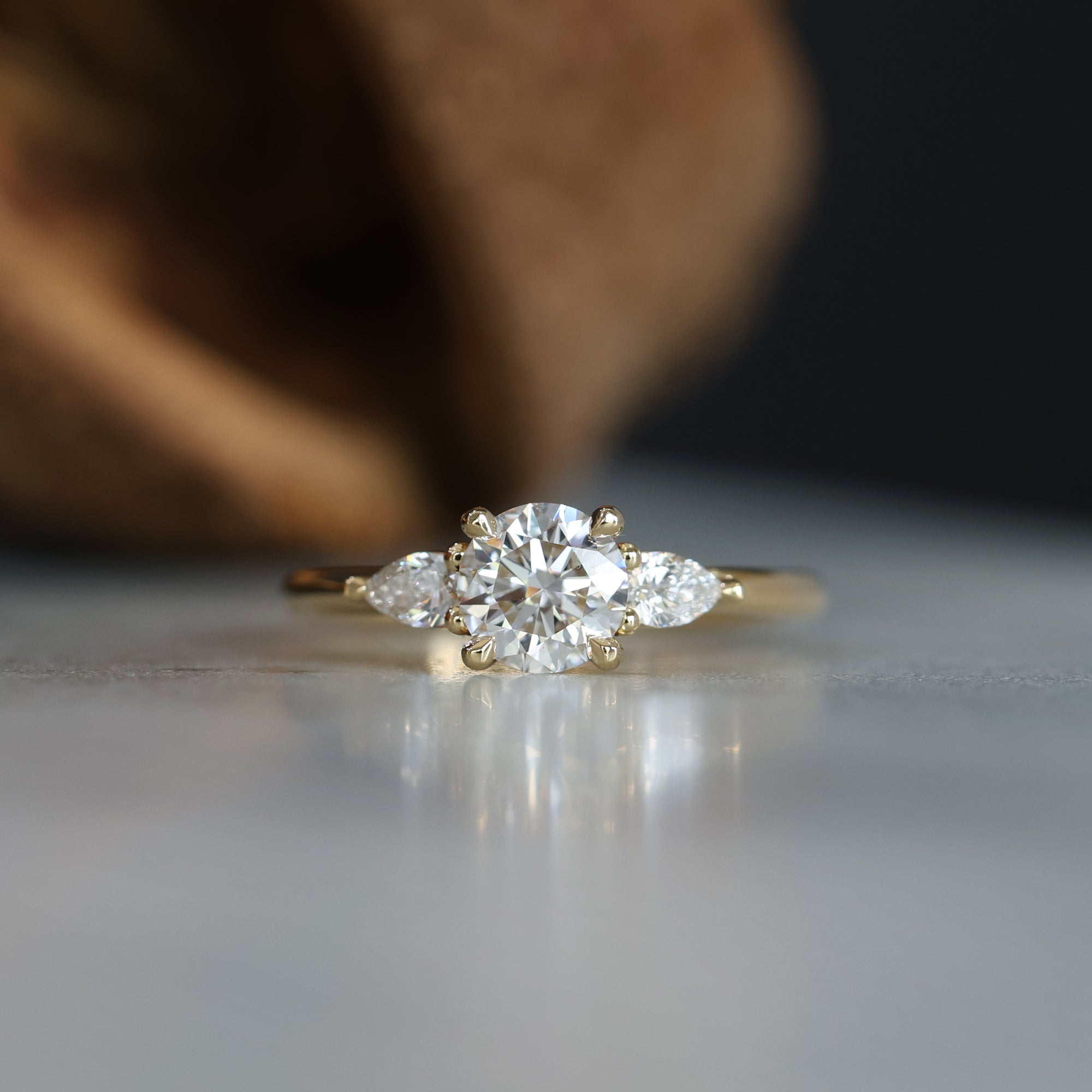 0.84 Carats Round Shape Moissanite Three Stone Engagement Ring