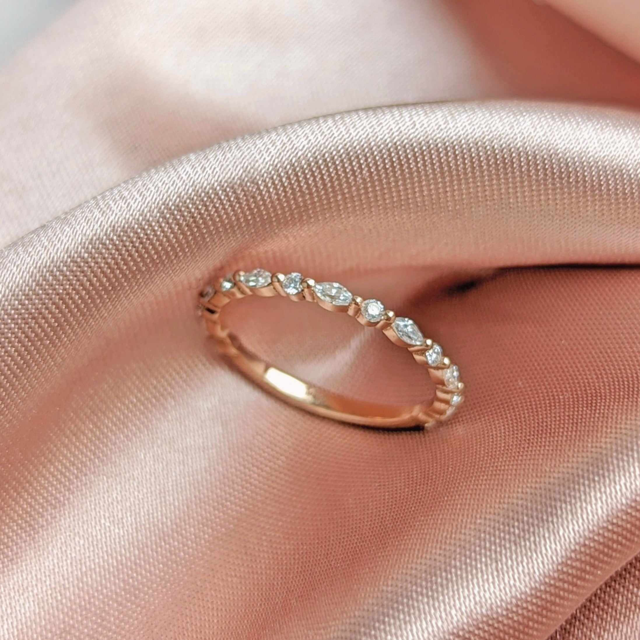 0.15 Carats Moissanite Round & Pear Shape Floating Wedding Band