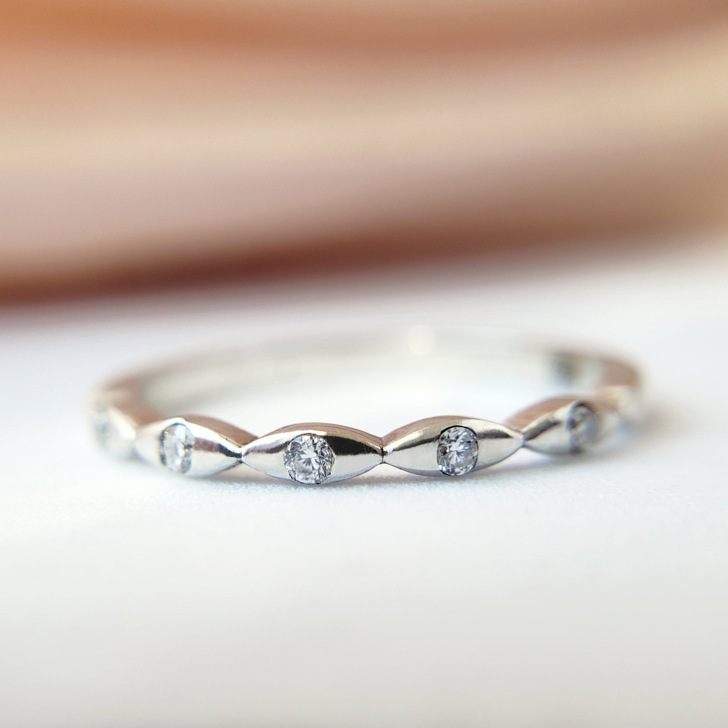 0.15 Carats Moissanite Round Shape Flush Wedding Band