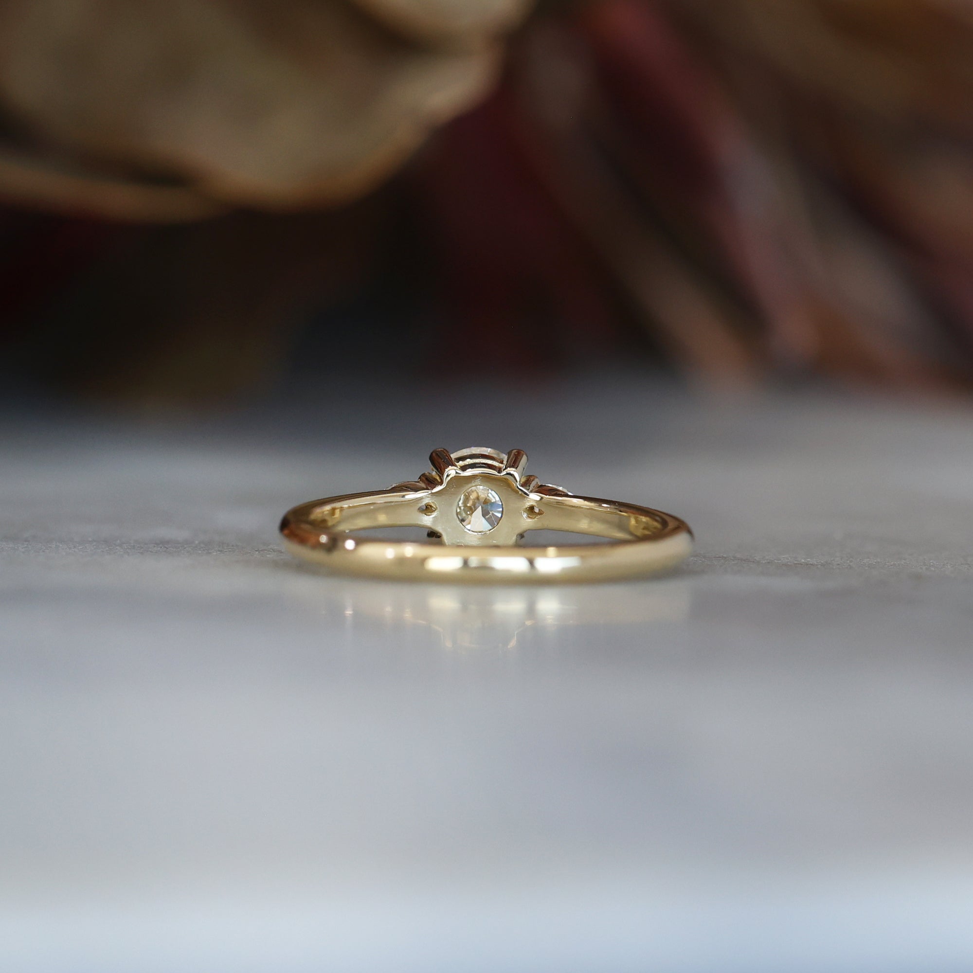 0.51 Carats Round Shape Moissanite Three Stone Engagement Ring