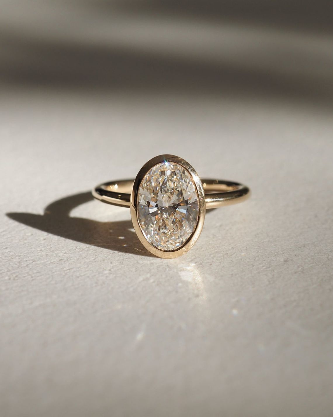 1.5 CT Oval F/VS1 CVD Diamond Bezel Engagement Ring