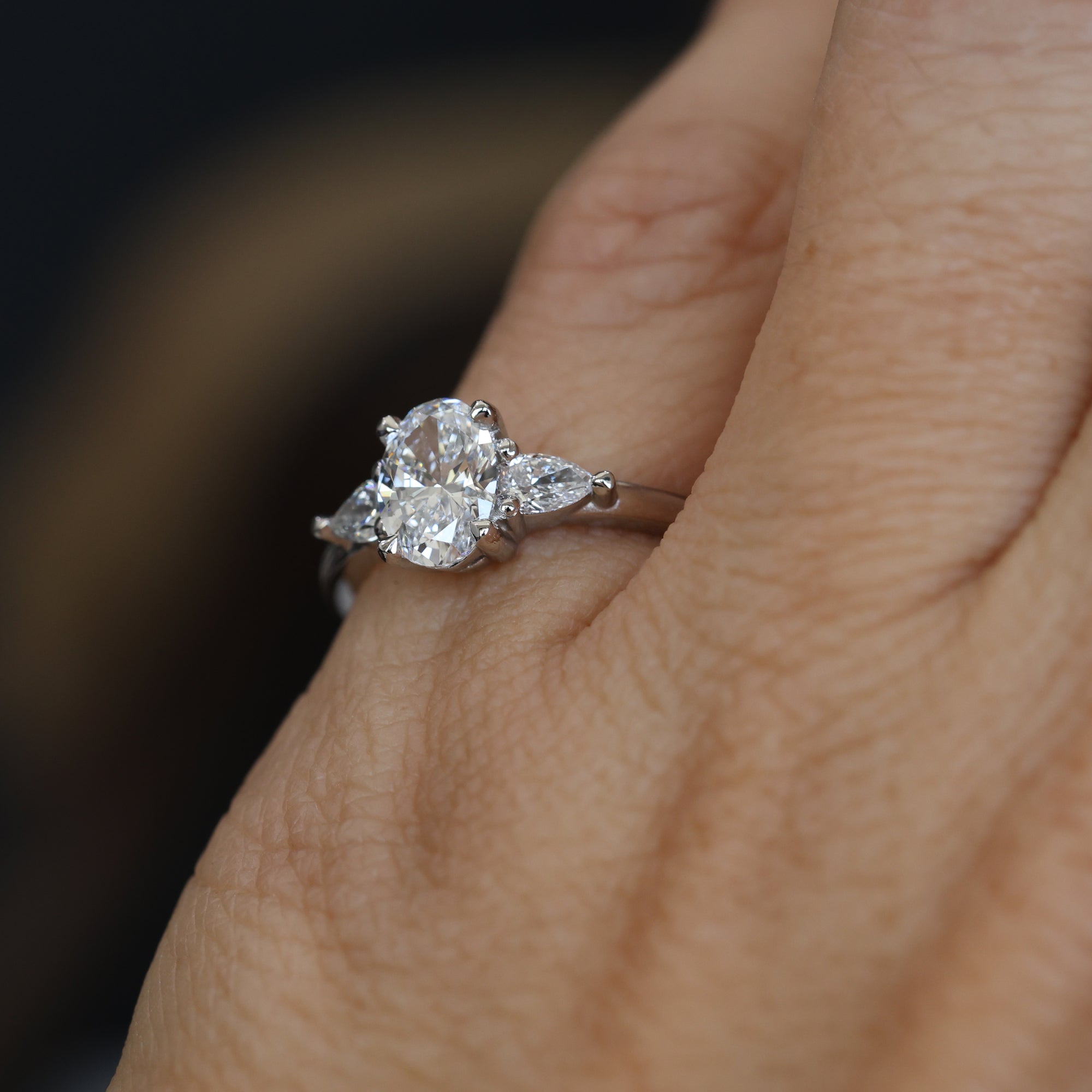 0.89 Carats Oval Shape Moissanite Three Stone Engagement Ring