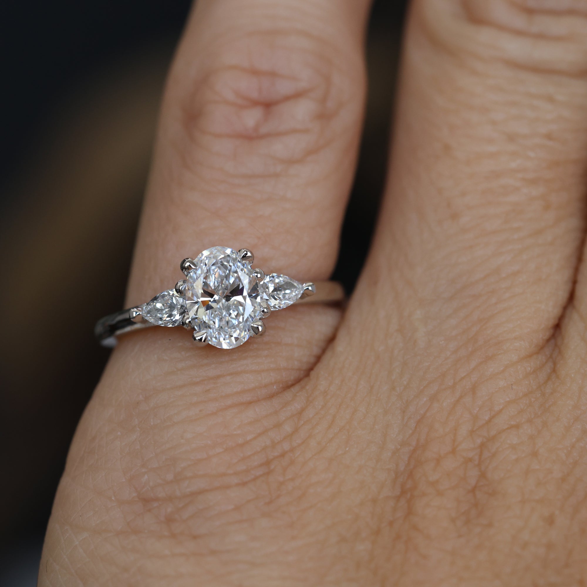 0.89 Carats Oval Shape Moissanite Three Stone Engagement Ring