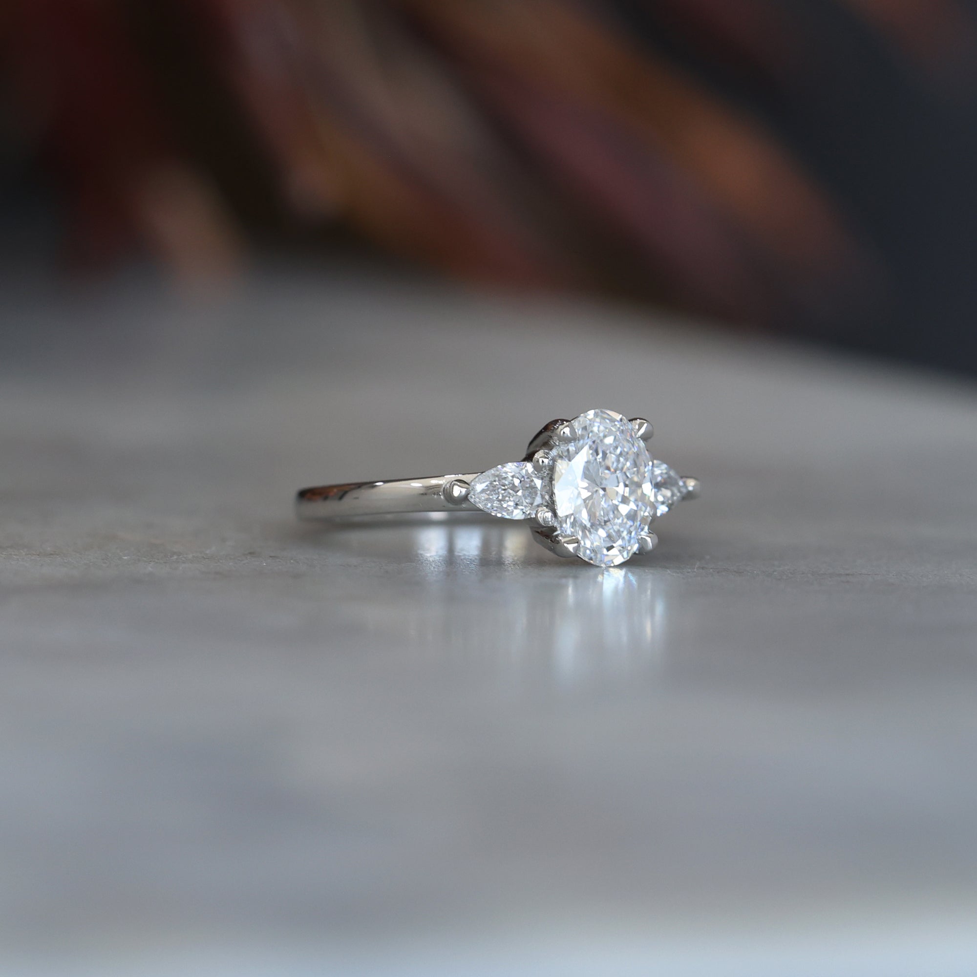 0.89 Carats Oval Shape Moissanite Three Stone Engagement Ring