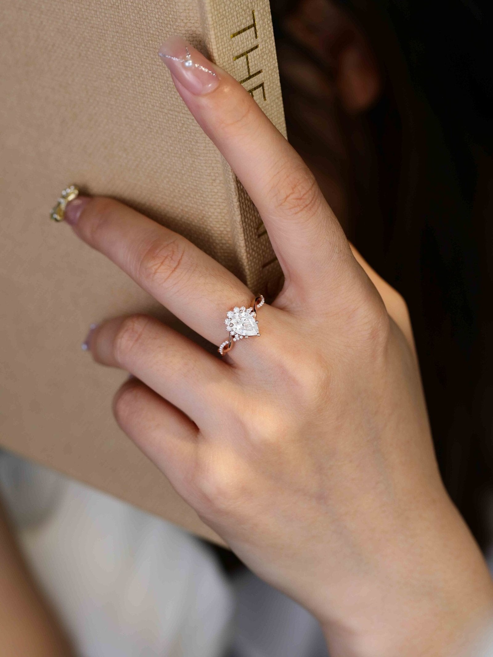 1.50 Carats Pear Shape Moissanite Twisted Engagement Ring