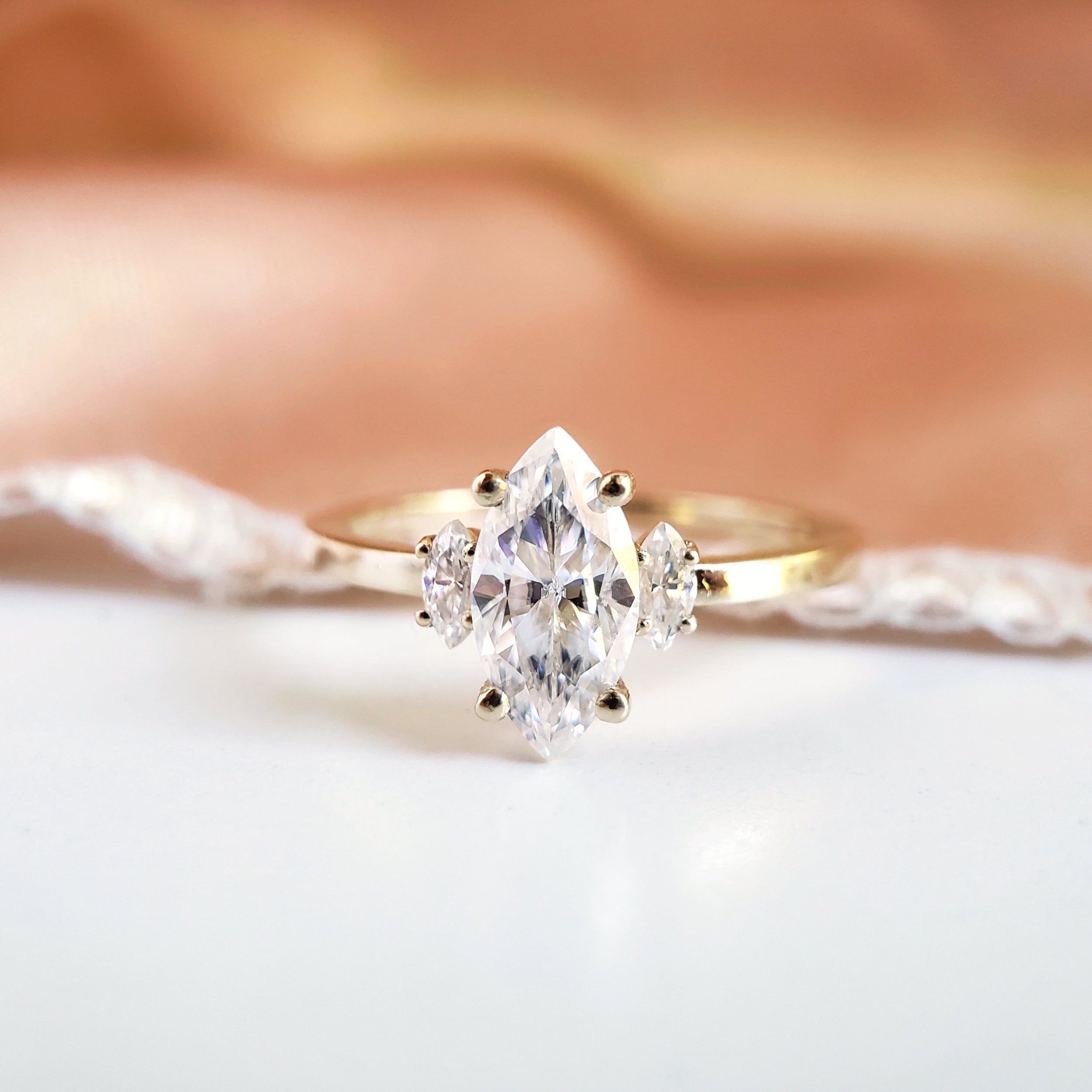 1.0 Carats Marquise Shape Moissanite Three Stone Engagement Ring