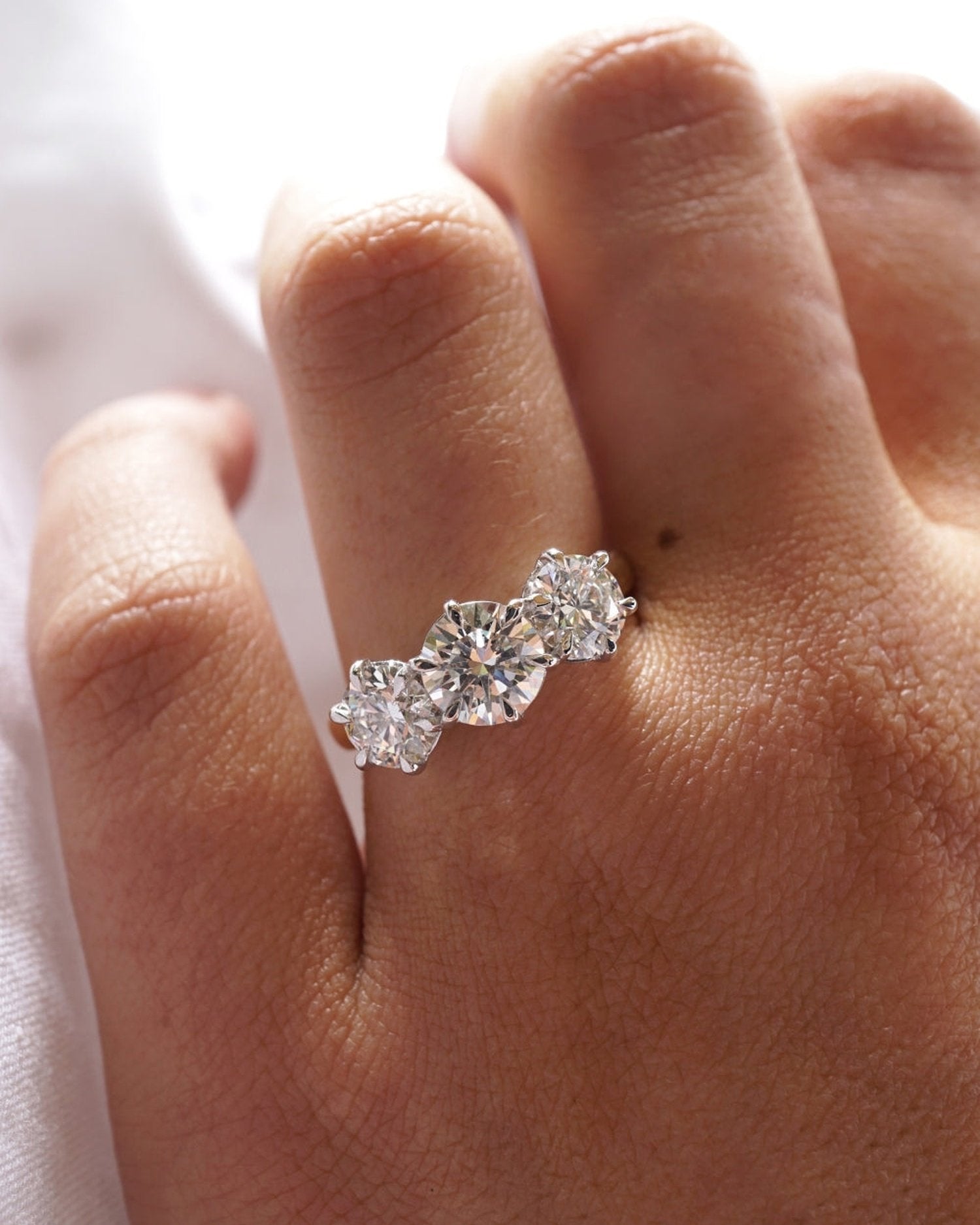 1.10 Carats Round Shape Moissanite Three Stone Engagement Ring
