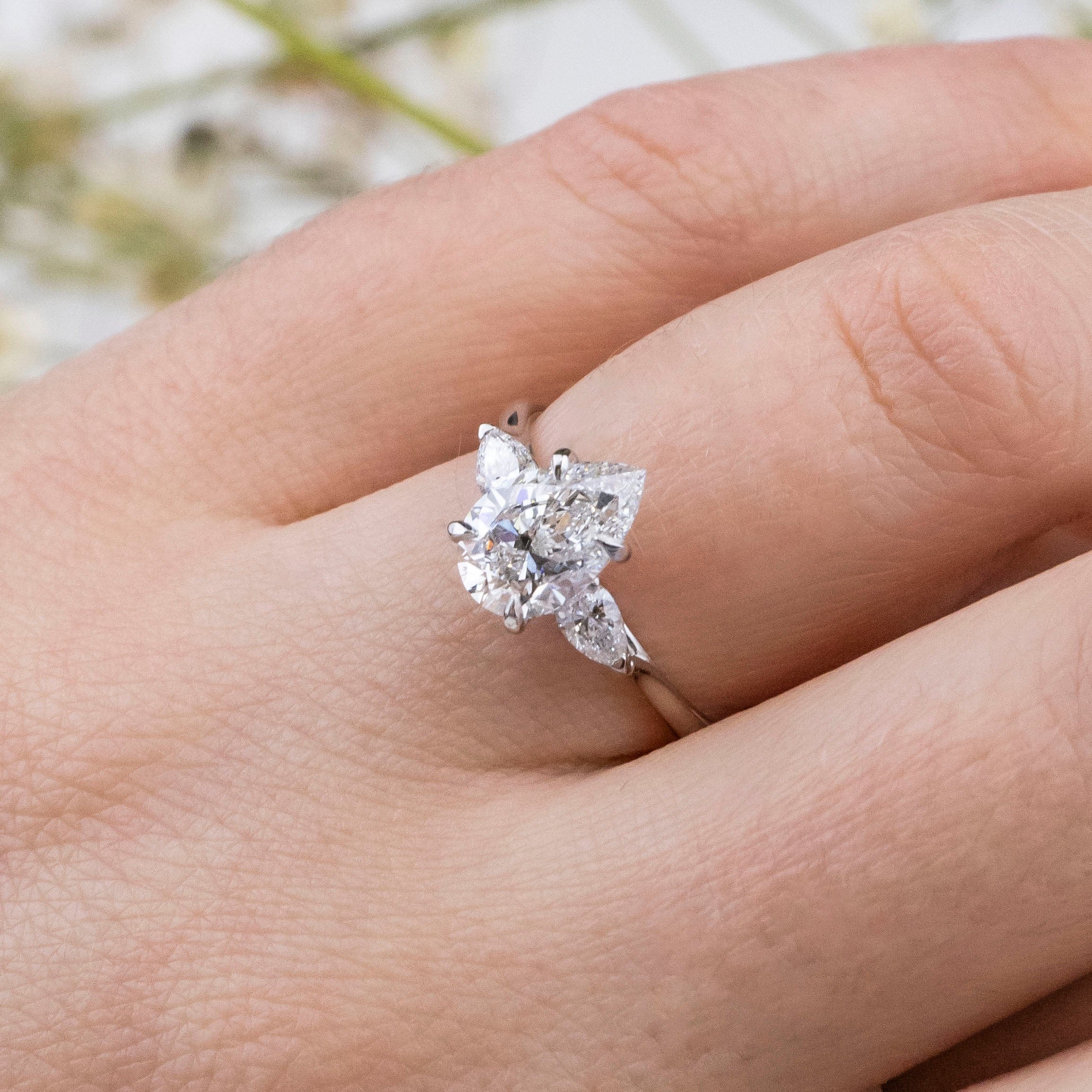 1.50 Carats Pear Shape Moissanite Three Stone Engagement Ring