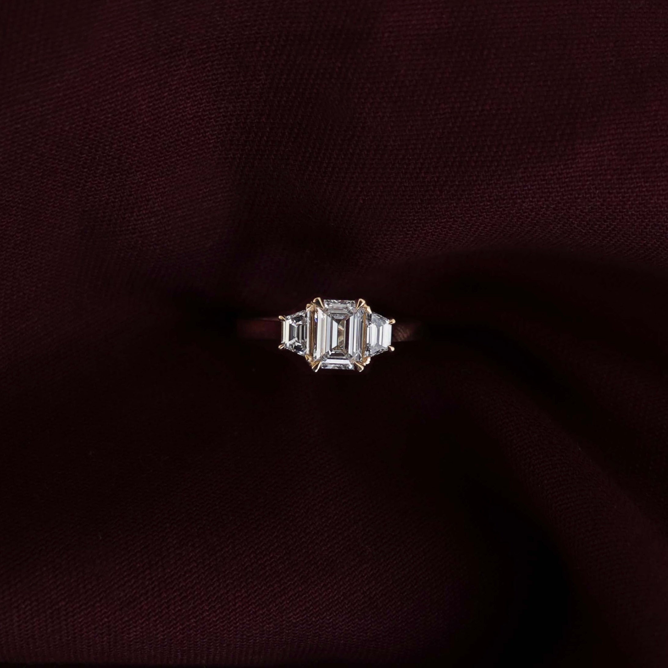 0.60 Carats Emerald Shape Moissanite Three Stone Engagement Ring