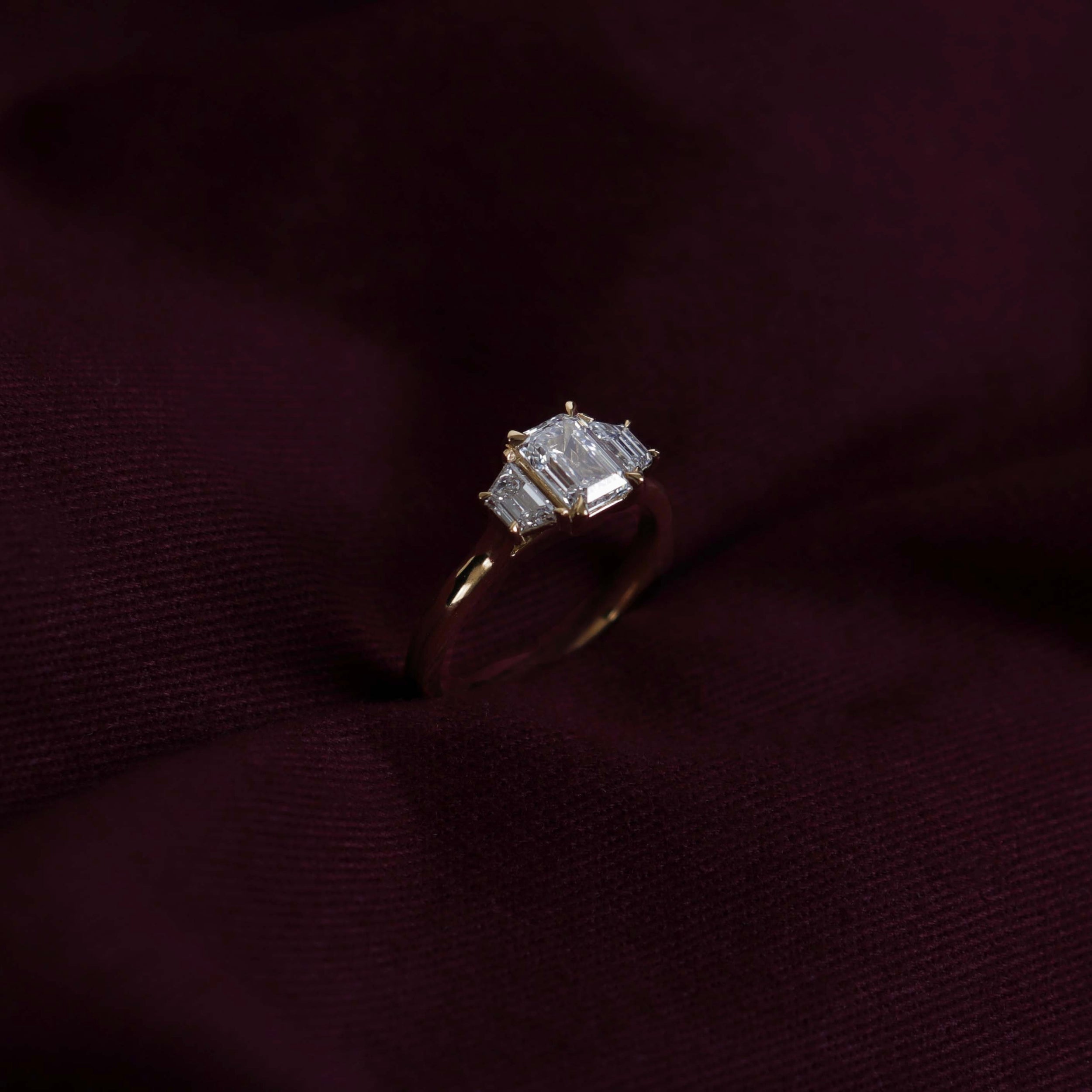 0.60 Carats Emerald Shape Moissanite Three Stone Engagement Ring
