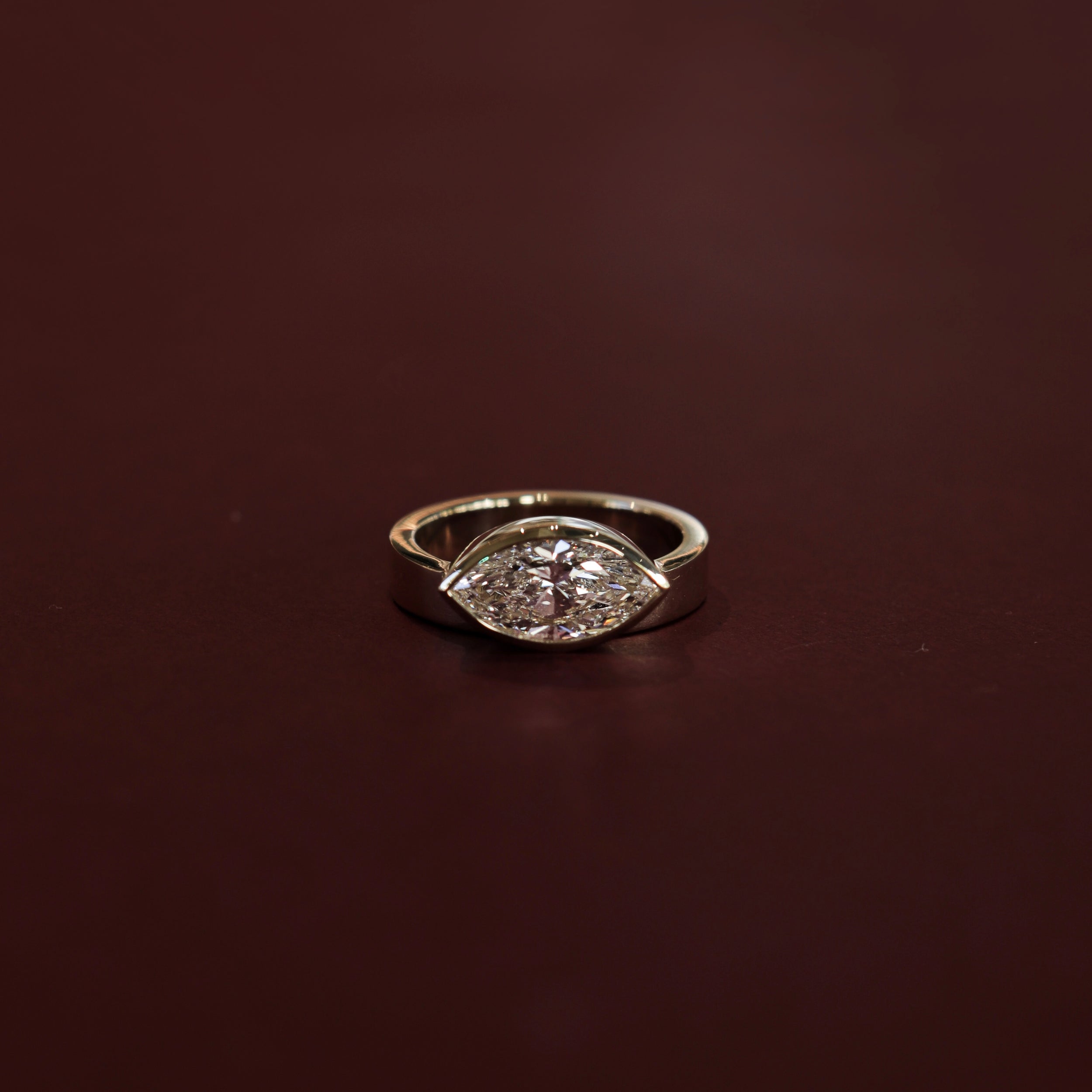 2.0 Carats East-West Marquise Shape Moissanite Bezel Solitaire Engagement Ring