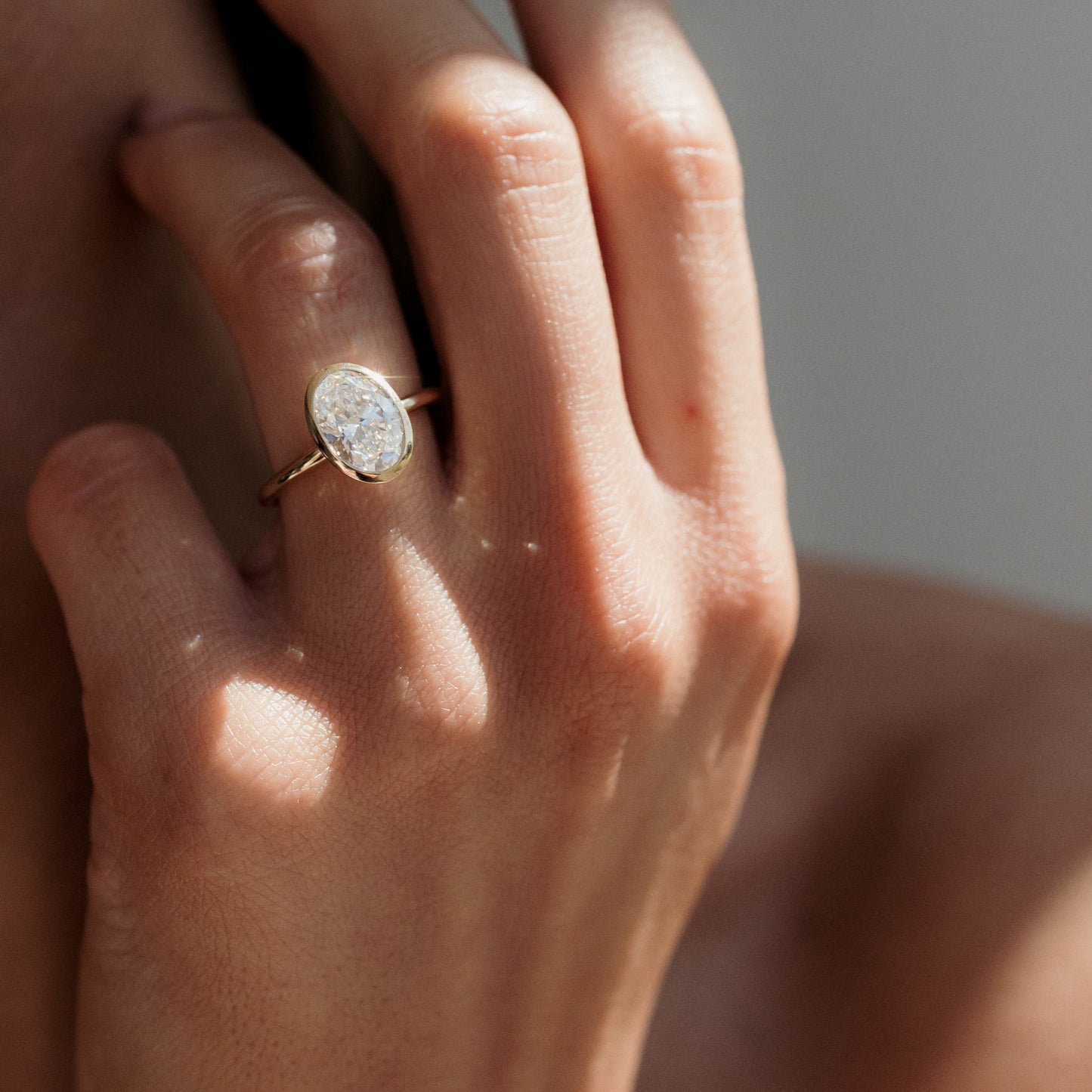 1.5 CT Oval F/VS1 CVD Diamond Bezel Engagement Ring