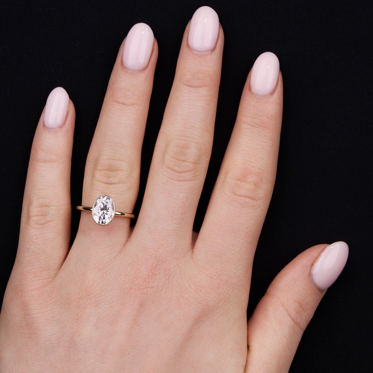0.80 Carats Oval Shape Moissanite Bezel Solitaire Engagement Ring