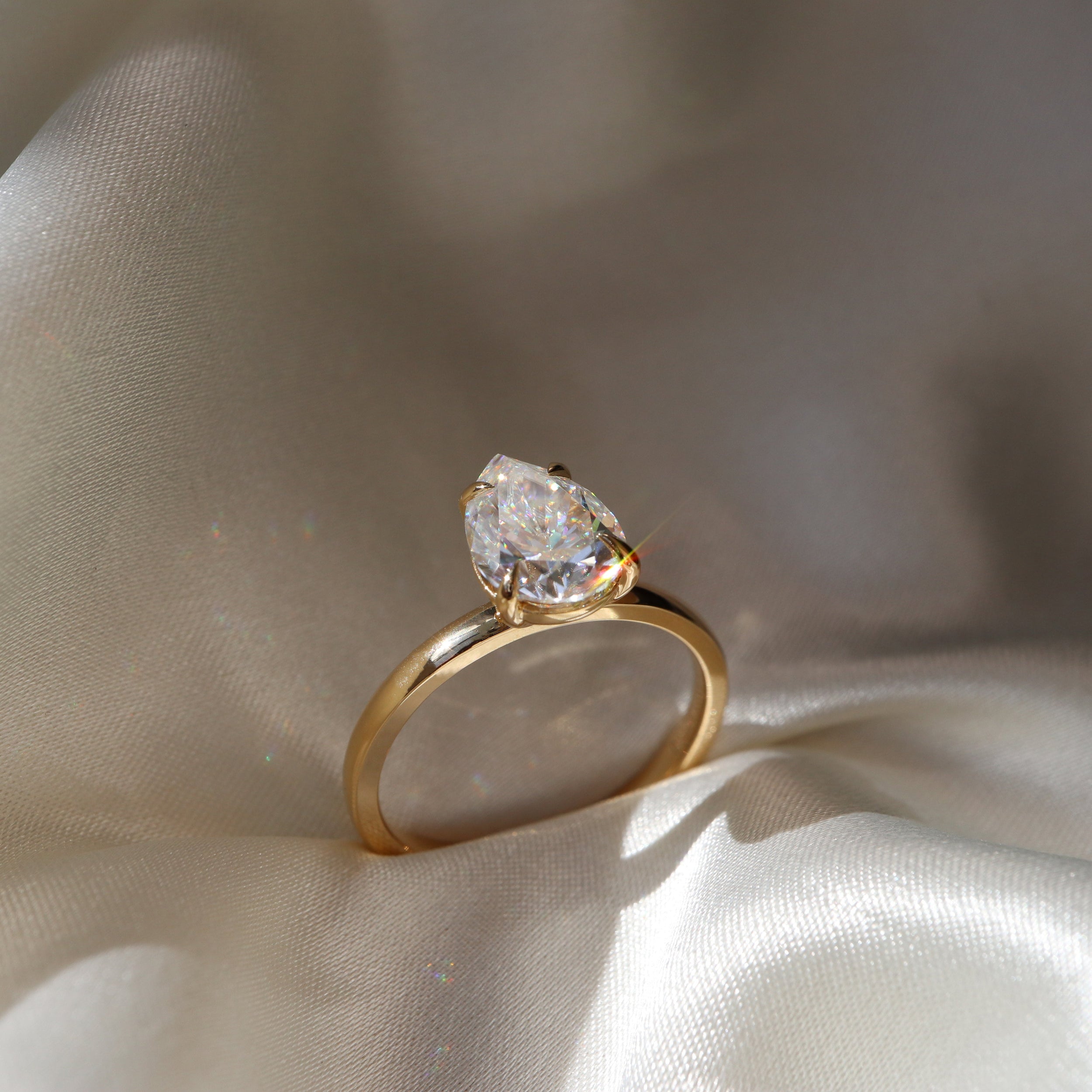 1.30 Carats Pear Shape Solitaire Moissanite Engagement Ring