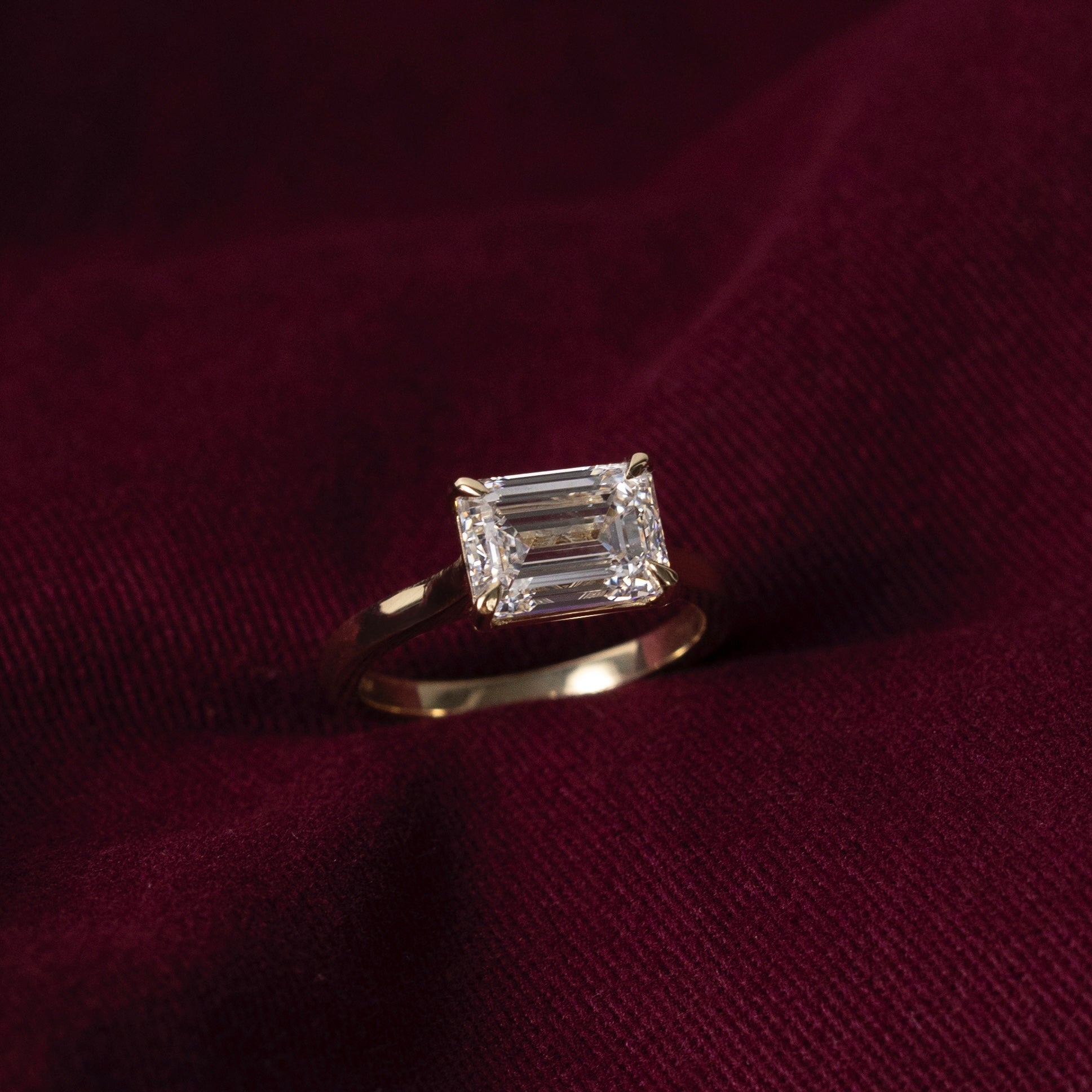 1.50 Carats East-West Emerald Shape Moissanite Solitaire Engagement Ring