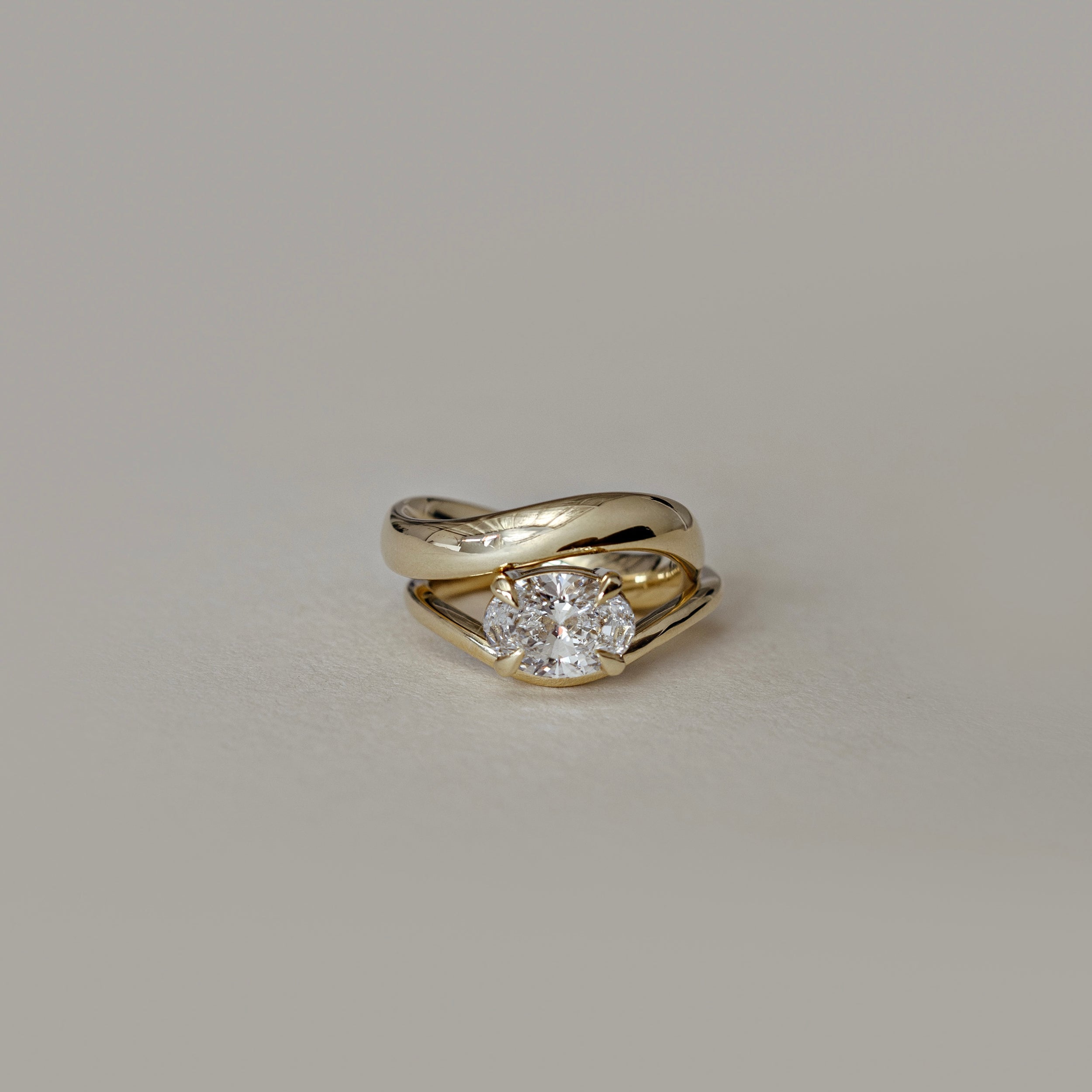 1.30 Carats East-West Oval Shape Moissanite Curved Solitaire Engagement Ring