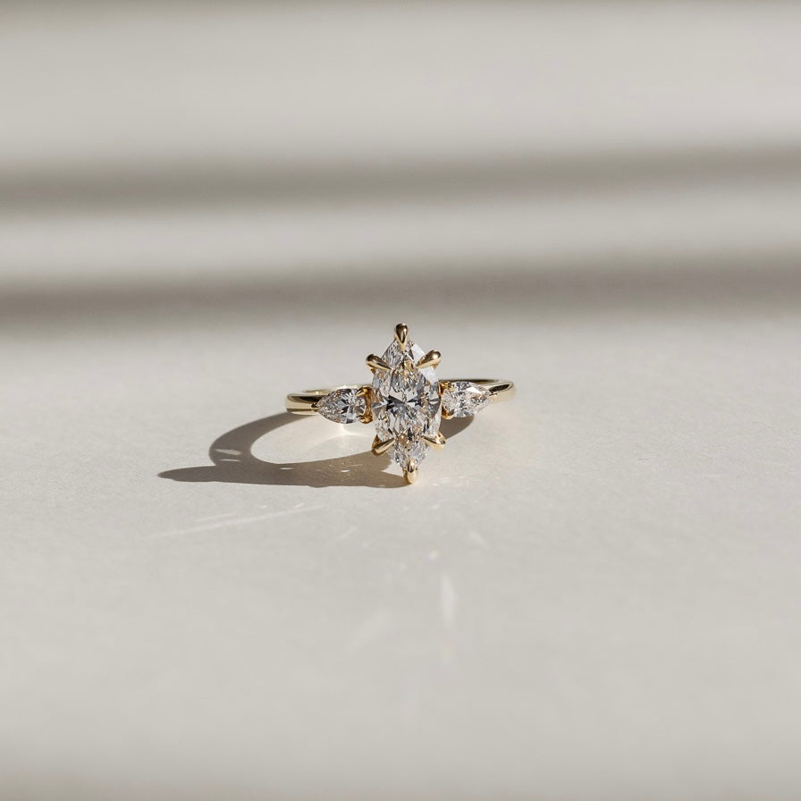 1.20 Carats Marquise Shape Moissanite Three Stone Engagement Ring