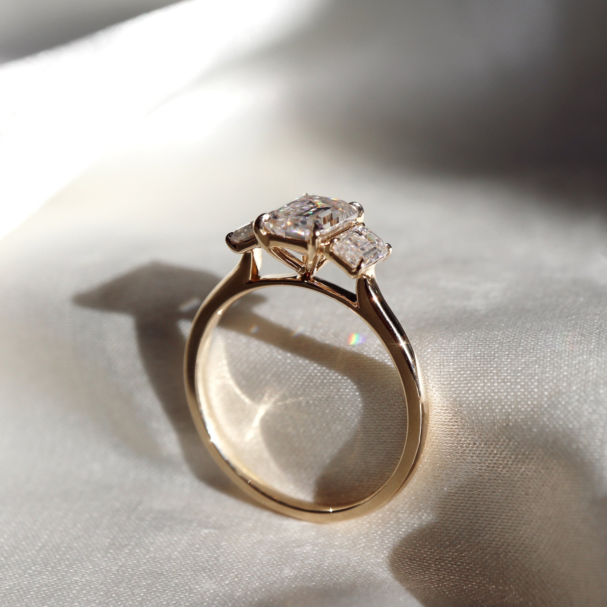 1.50 Carats Emerald Shape Three Stone Moissanite Engagement Ring