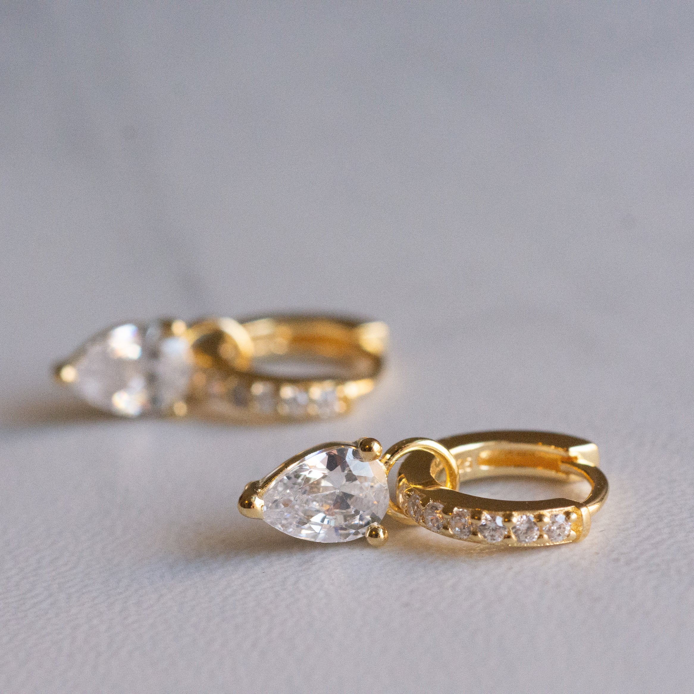 1.25 TCW Pear Shape Moissanite Huggies Earrings