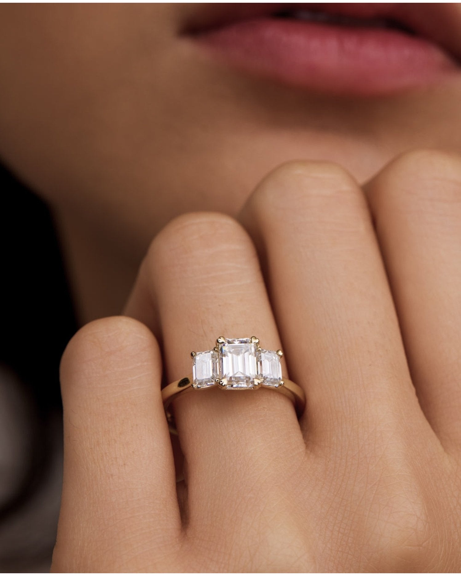 1.10 Carats Emerald Shape Moissanite Three Stone Engagement Ring