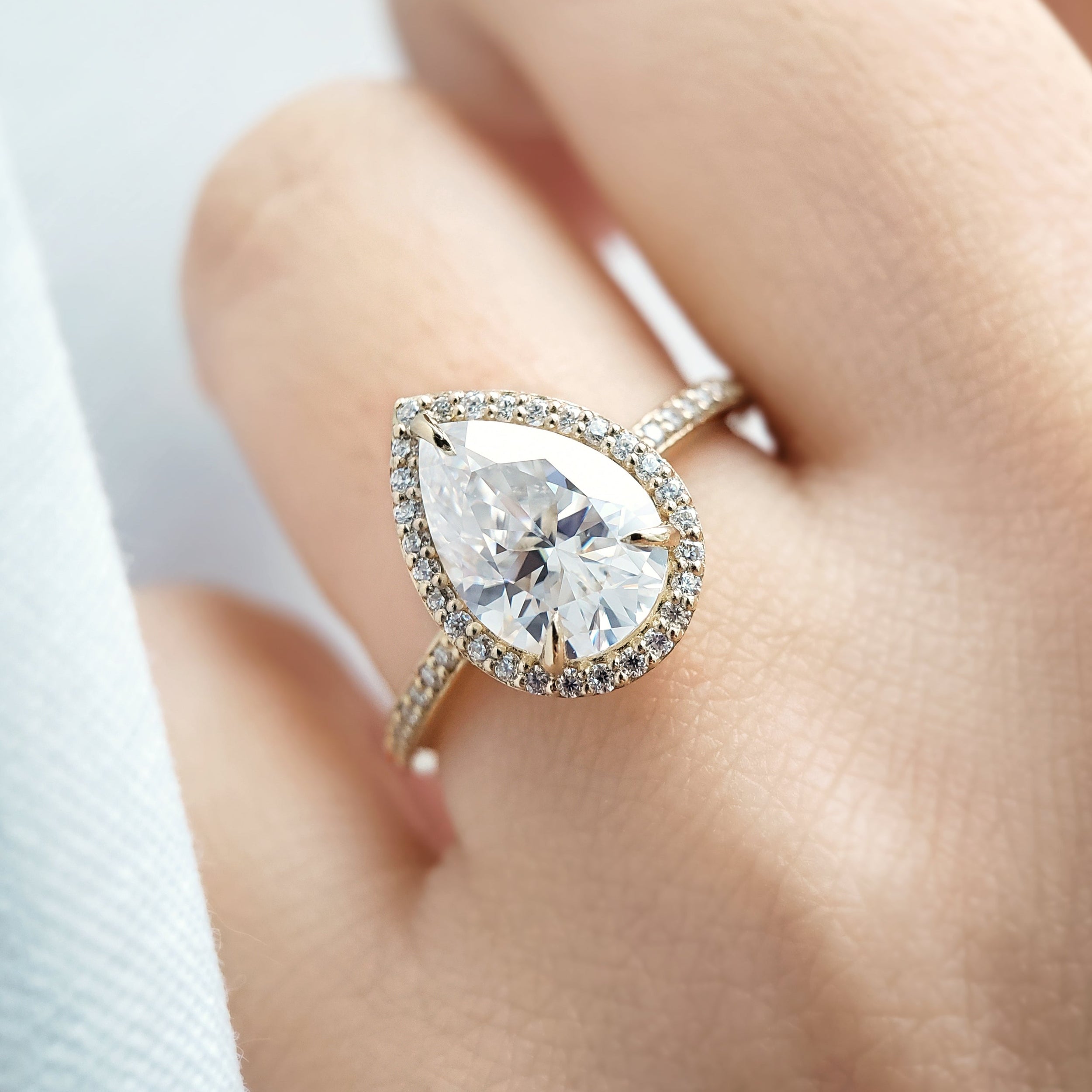 2.10 Carats Pear Shape Moissanite Halo & Pave Engagement Ring