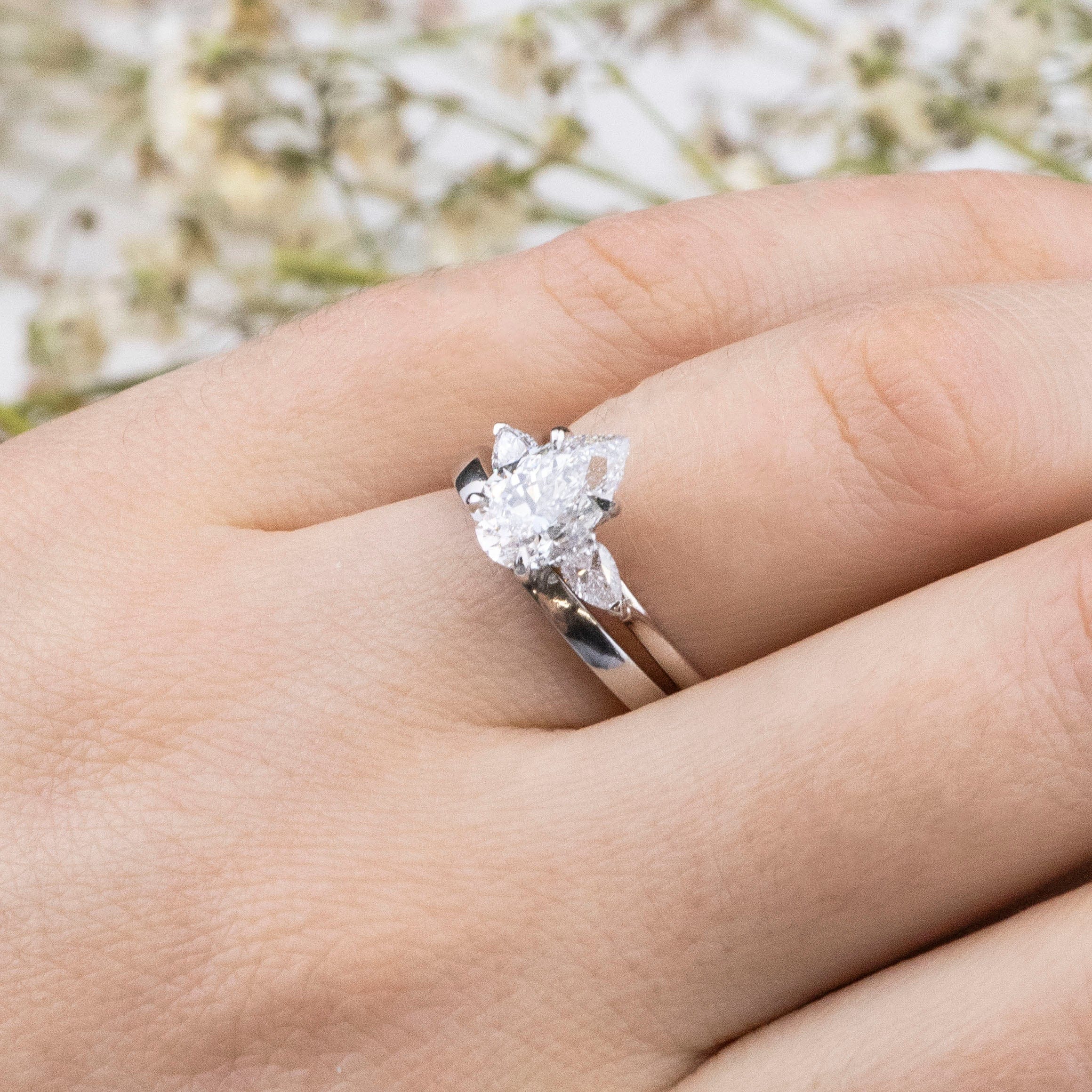 1.50 Carats Pear Shape Moissanite Three Stone Engagement Ring