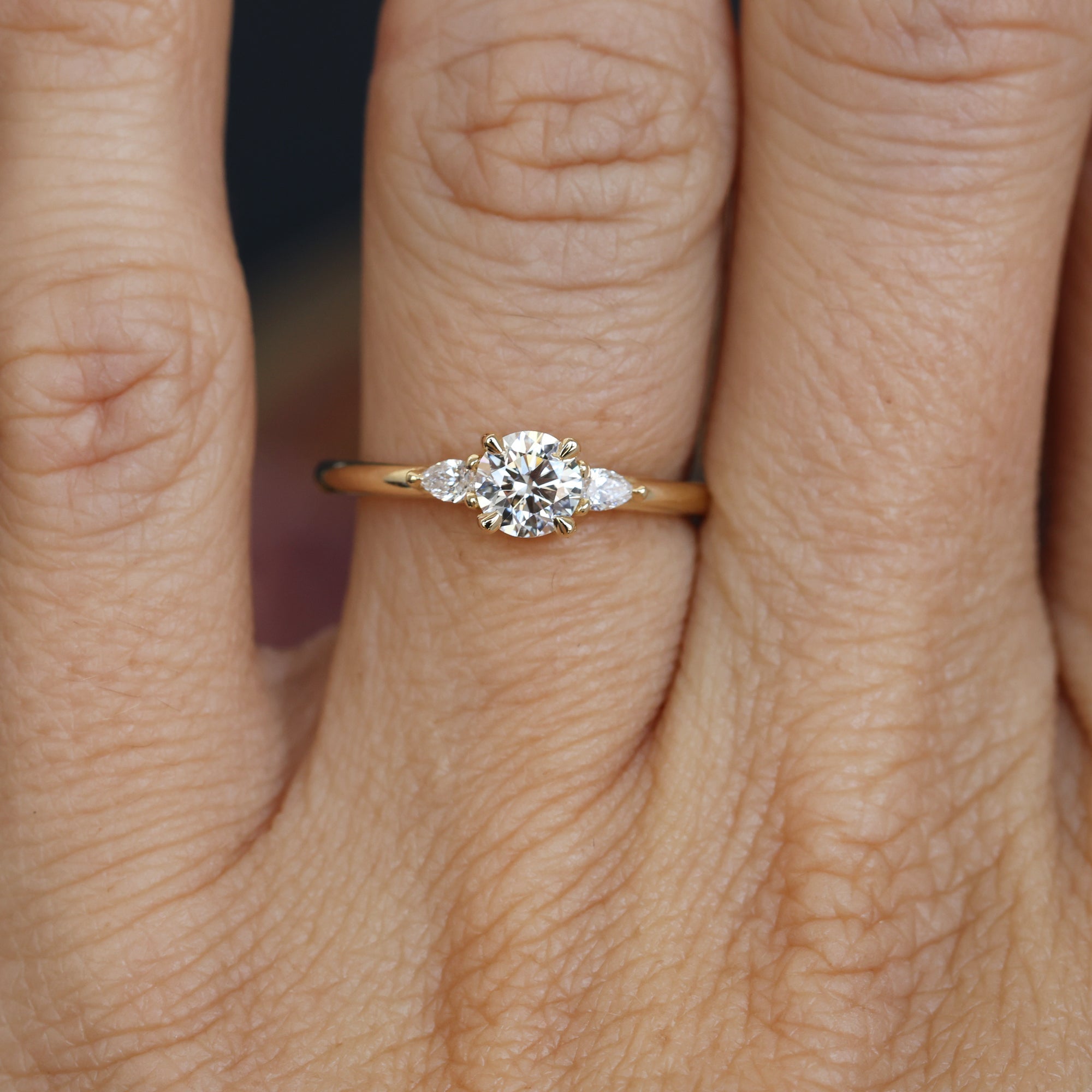 0.51 Carats Round Shape Moissanite Three Stone Engagement Ring