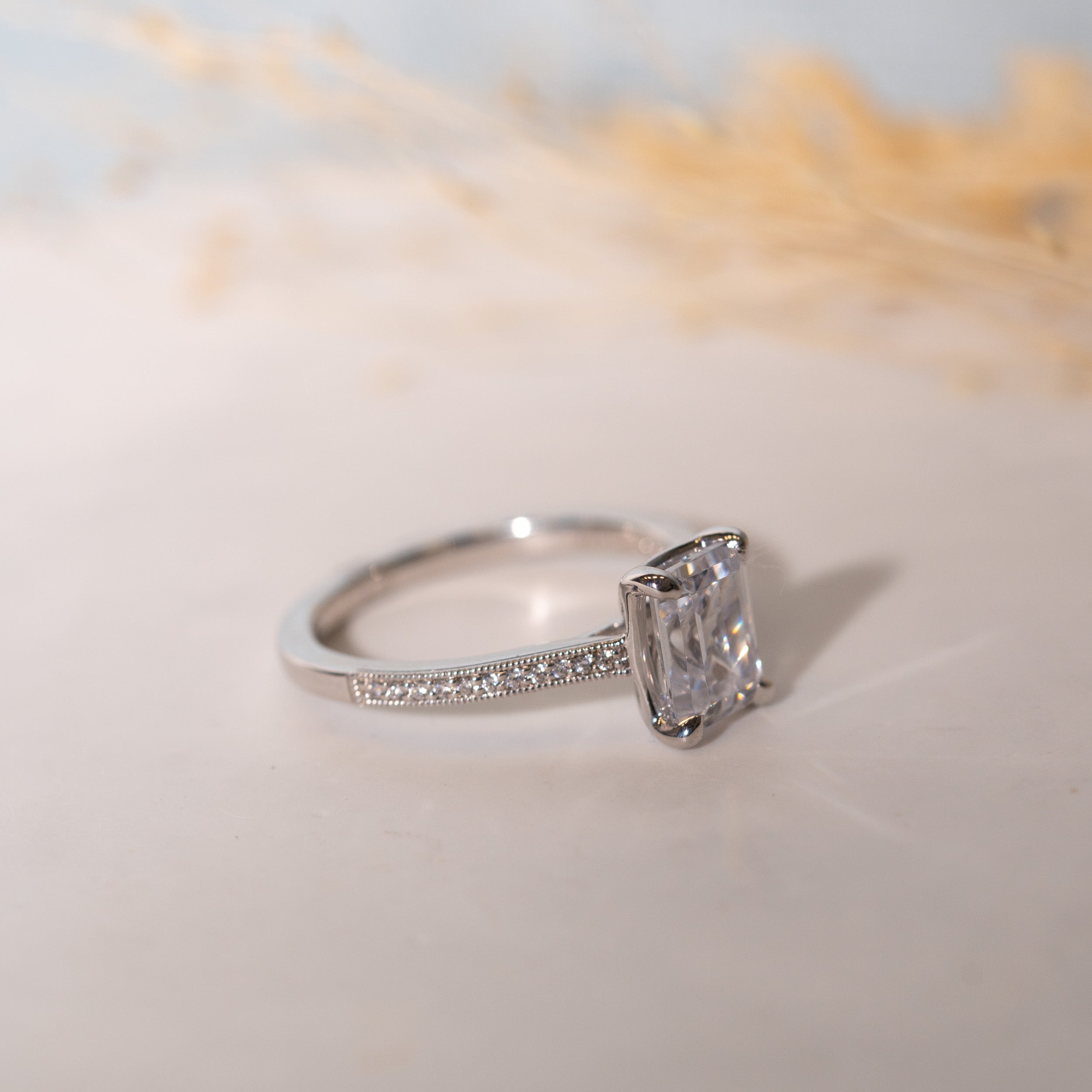 1.09 Carats Emerald Shape Moissanite Pave Engagement Ring