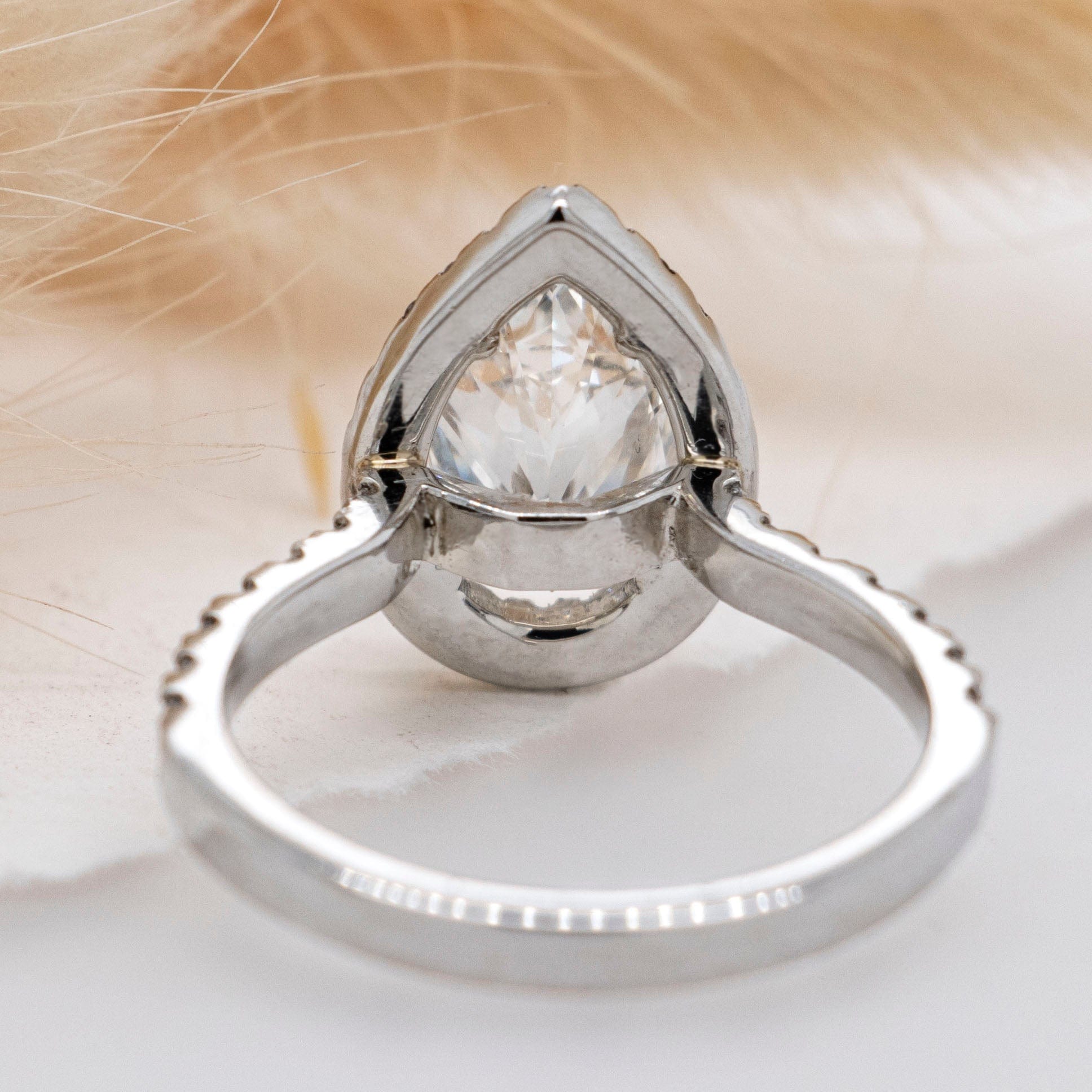 1.01 Carats Pear Shape Moissanite Halo & Pave Engagement Ring