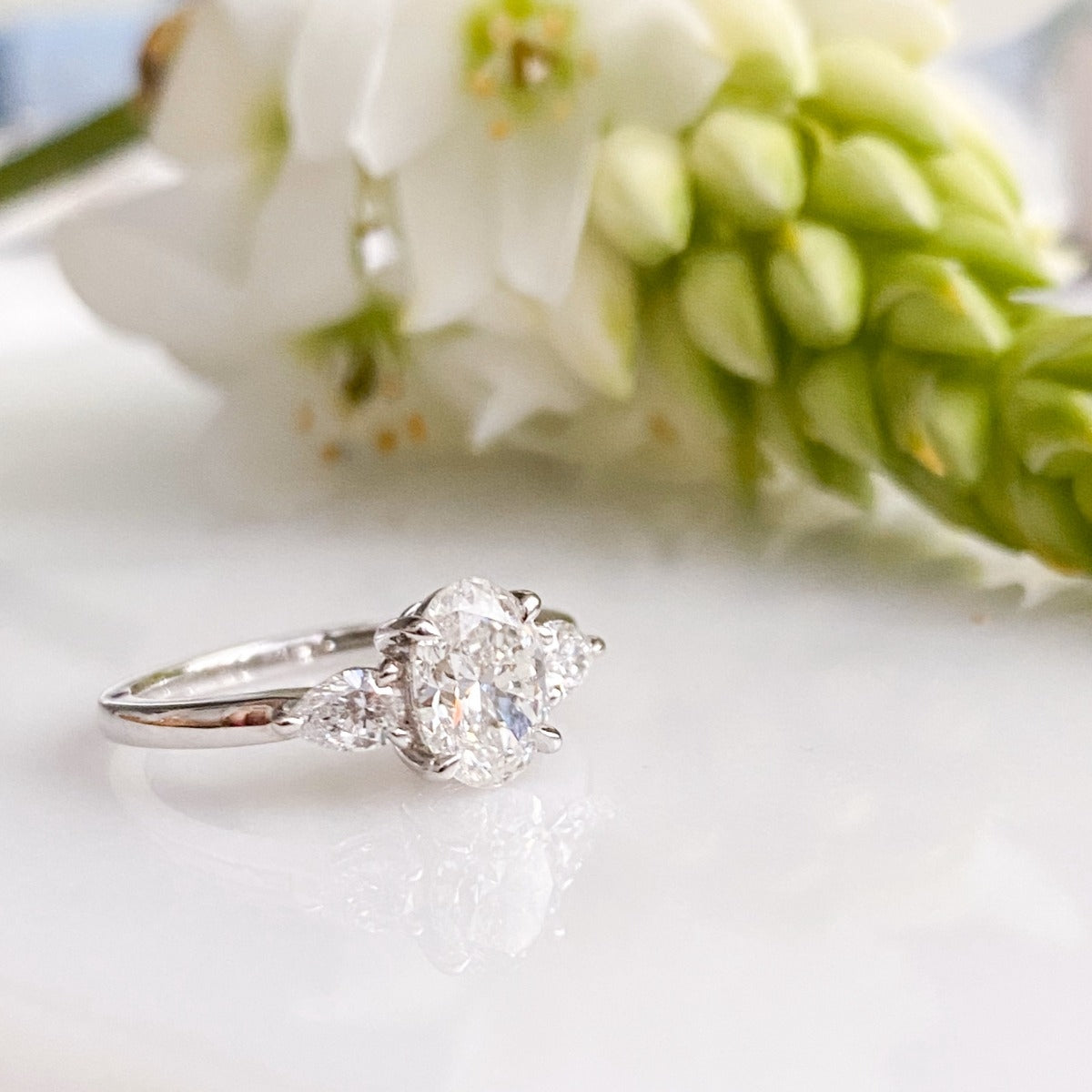 1.16 Carats Oval Shape Moissanite Three Stone Engagement Ring