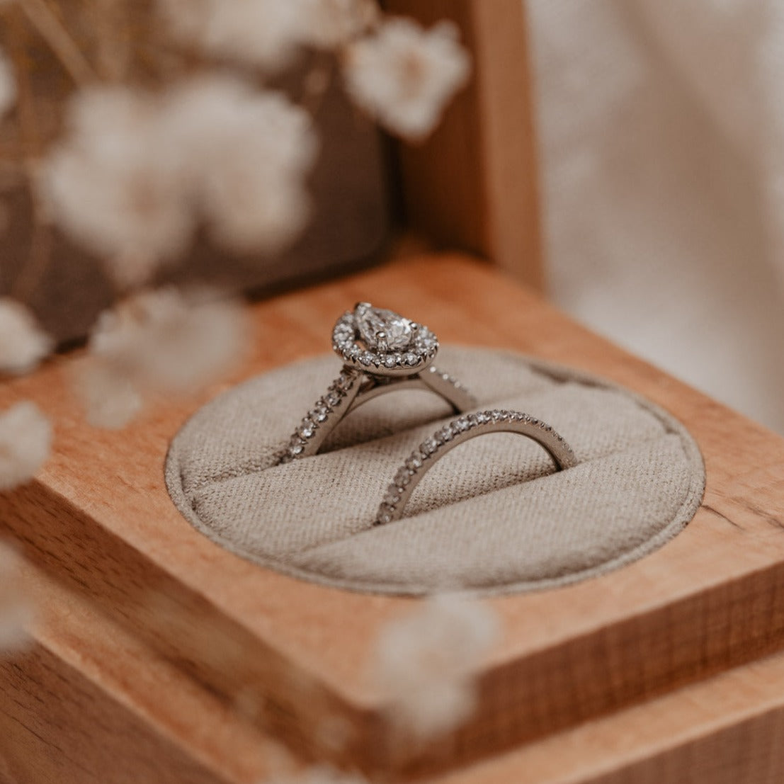 0.95 Carats Pear Shape Moissanite Halo & Pave Engagement Ring