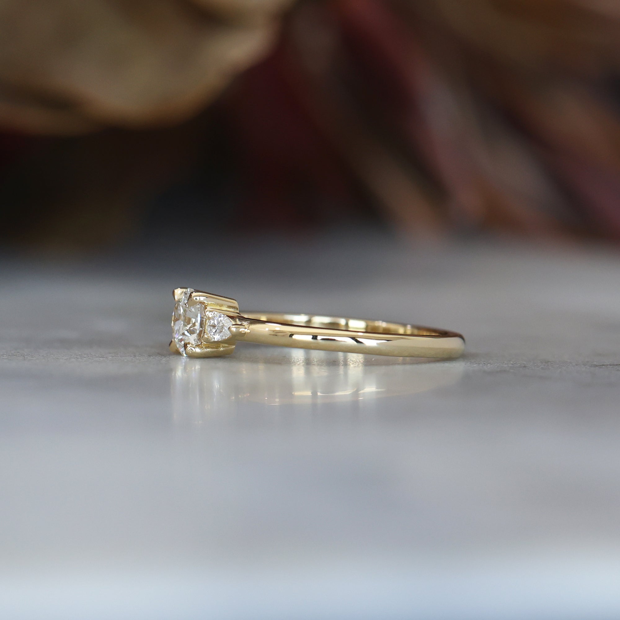 0.51 Carats Round Shape Moissanite Three Stone Engagement Ring