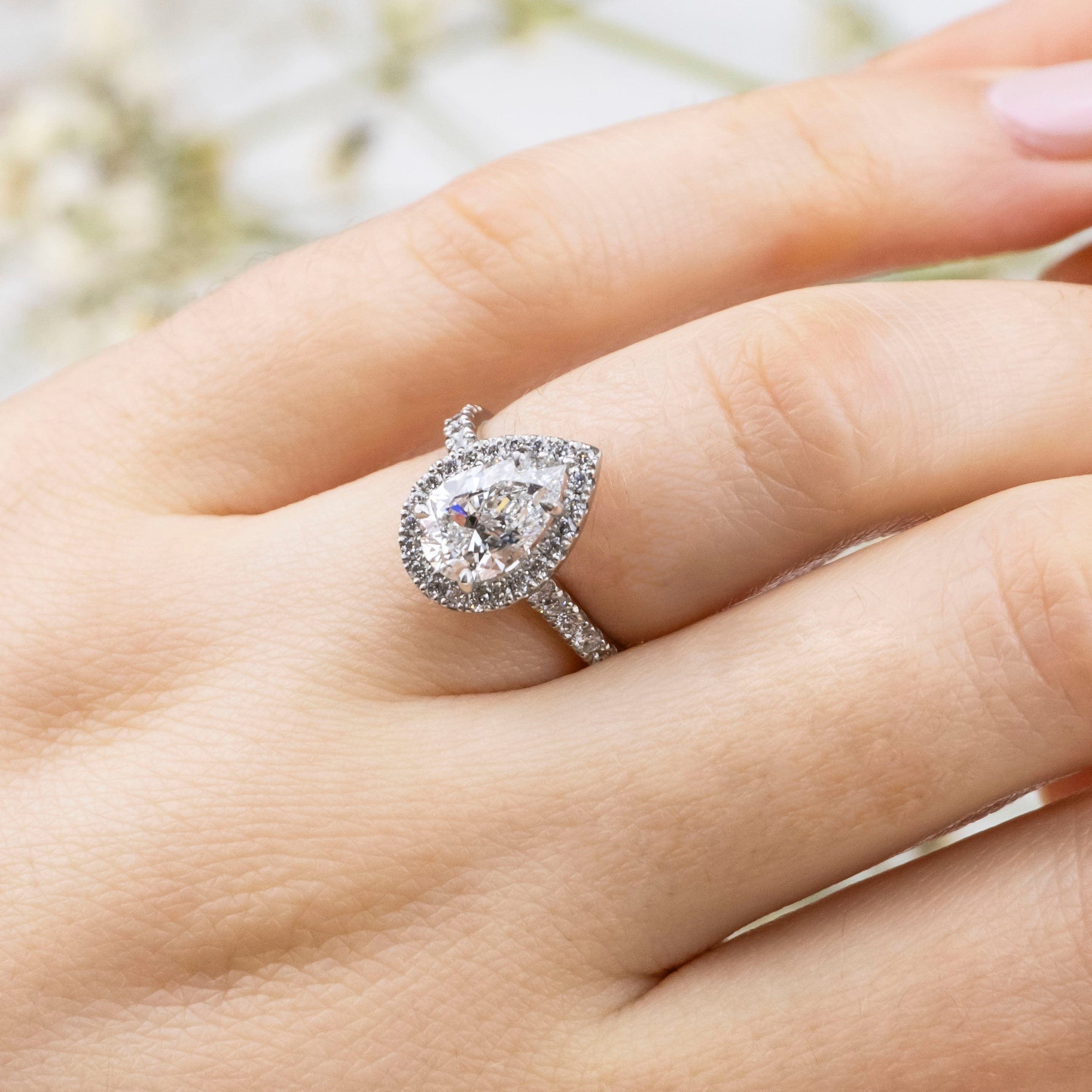 1.01 Carats Pear Shape Moissanite Halo & Pave Engagement Ring