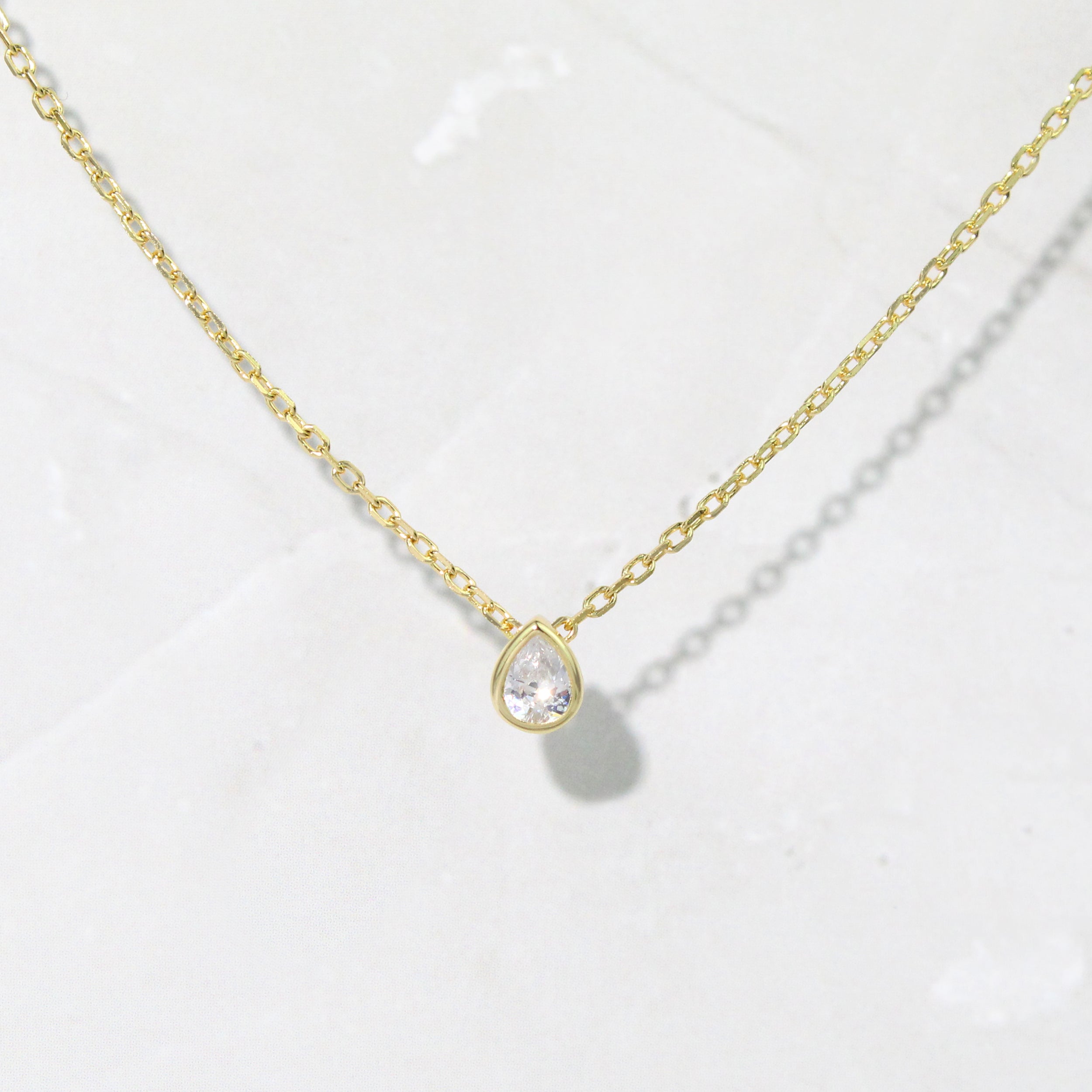 1.0 Carats Pear Shape Moissanite Bezel Solitaire Necklace