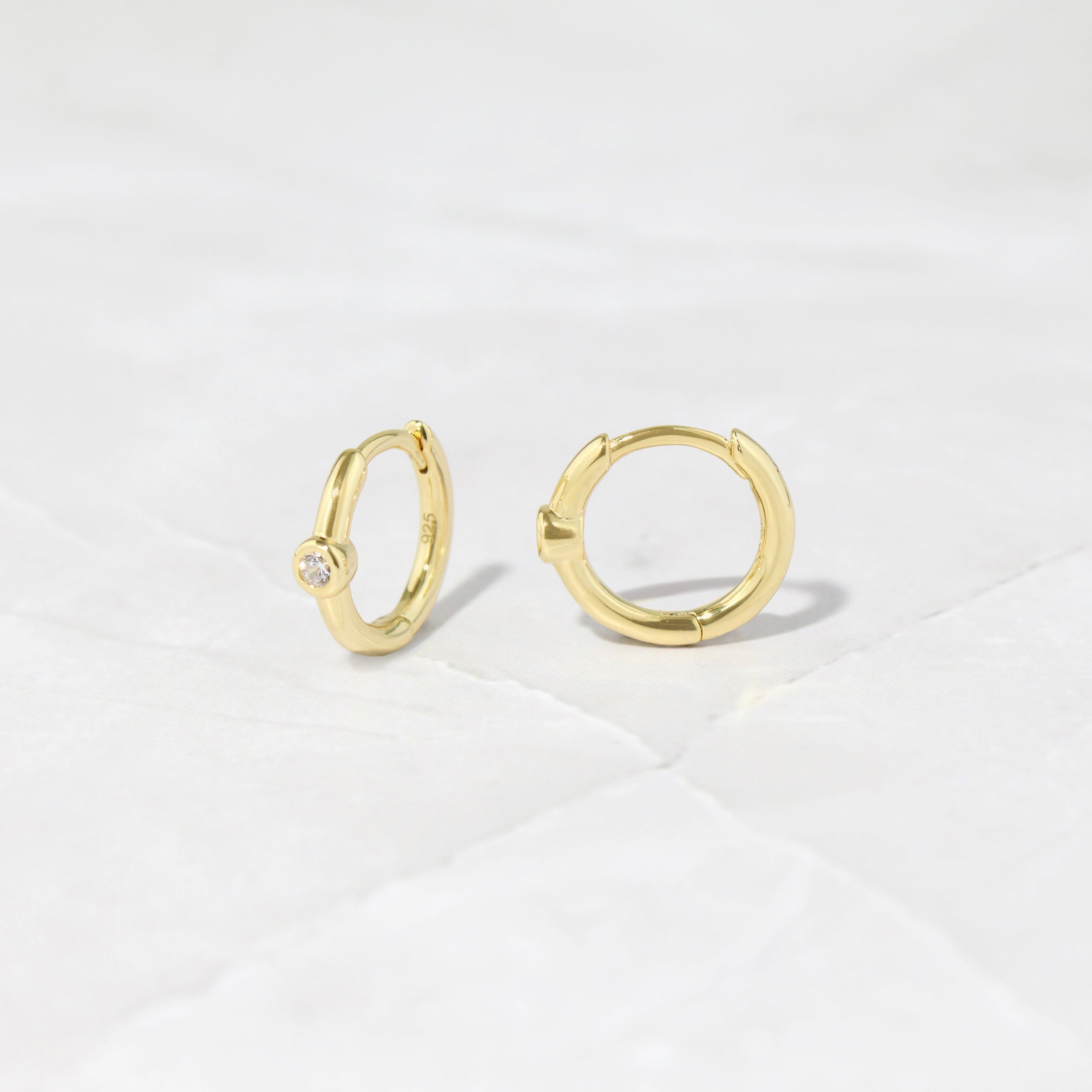 0.15 TCW Round Shape Moissanite Huggie Bezel Earrings