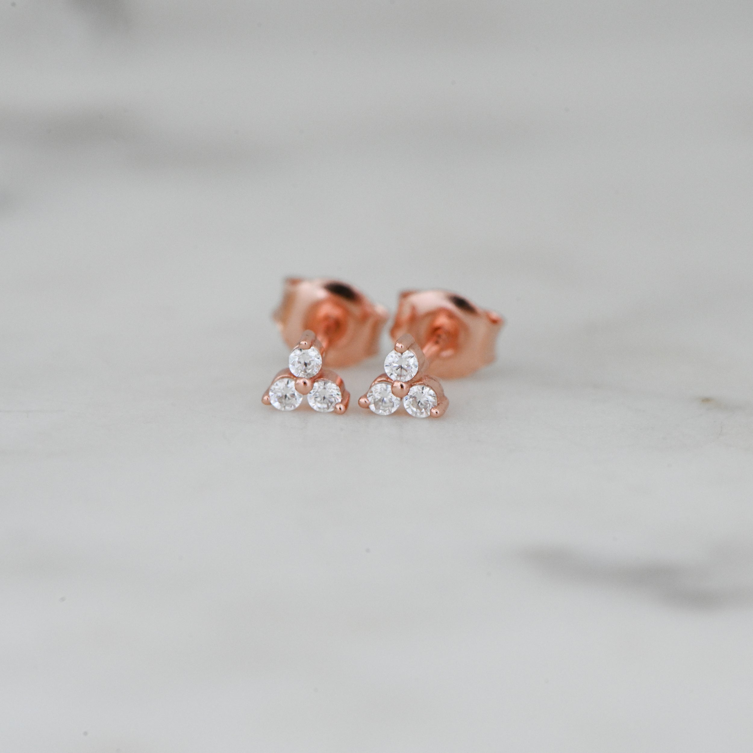 0.30 TCW Round Shape Moissanite Three Stone Stud Earrings