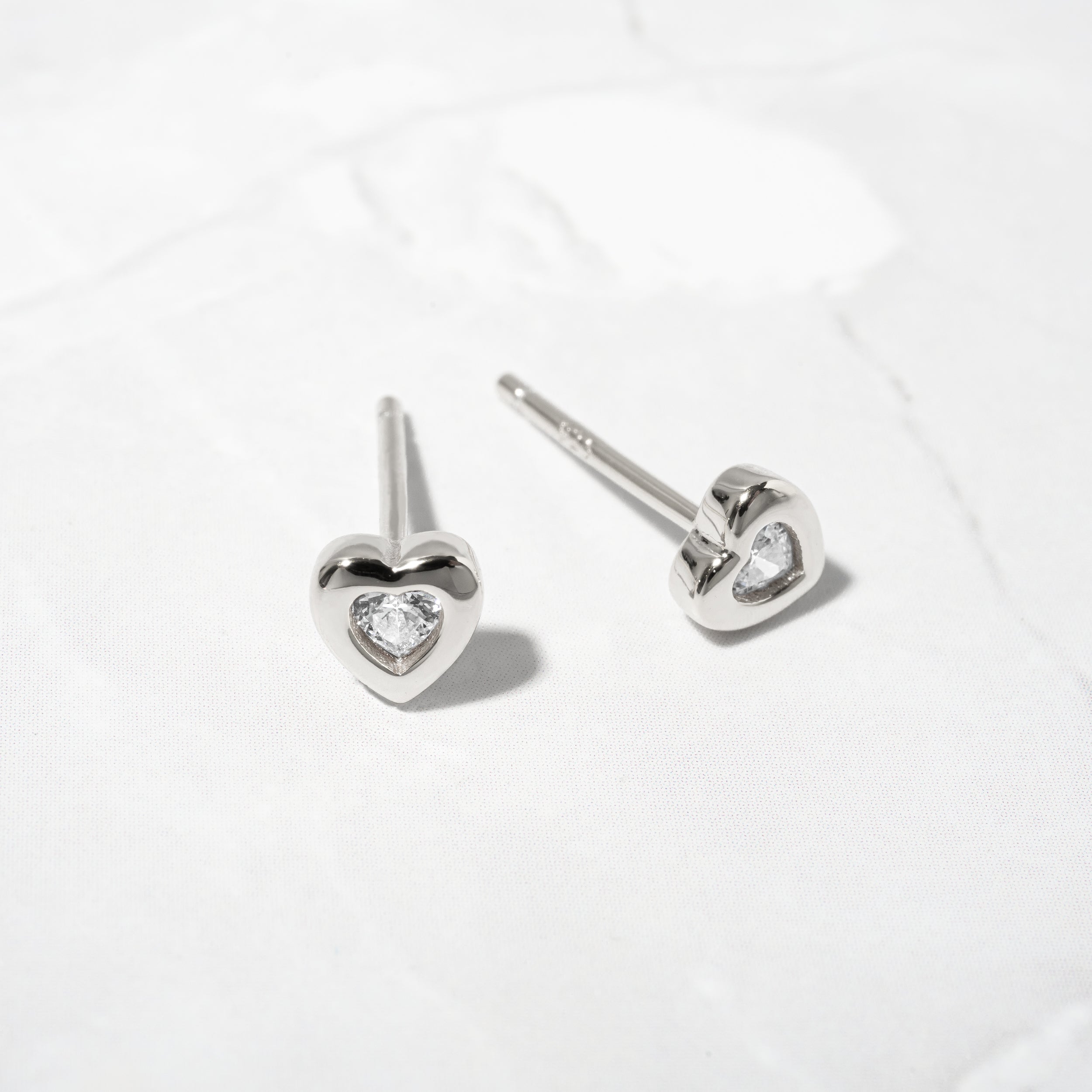 0.30 TCW Heart Shape Moissanite Solitaire Stud Earrings