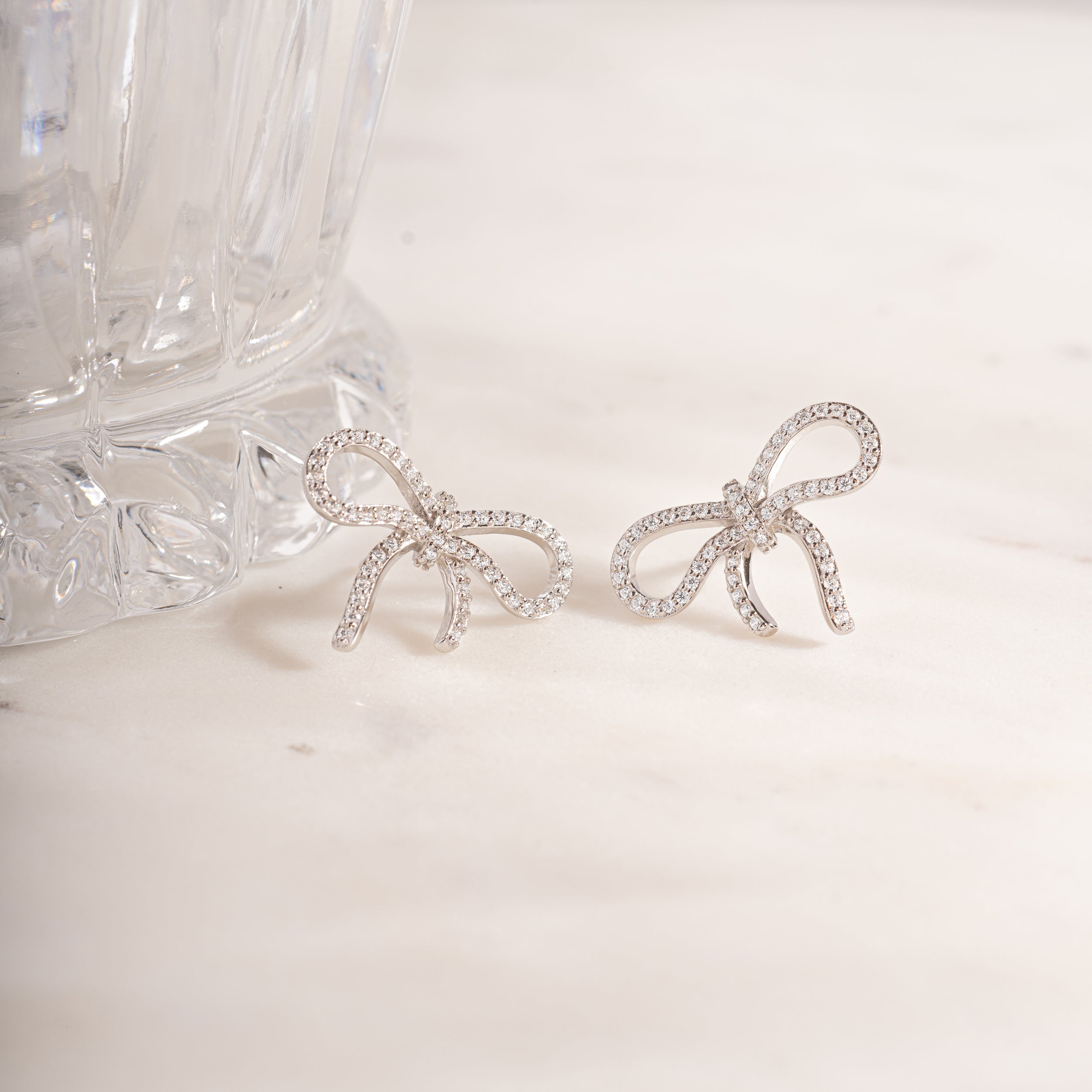 1.0 TCW Round Shape Moissanite Bow Stud Earrings