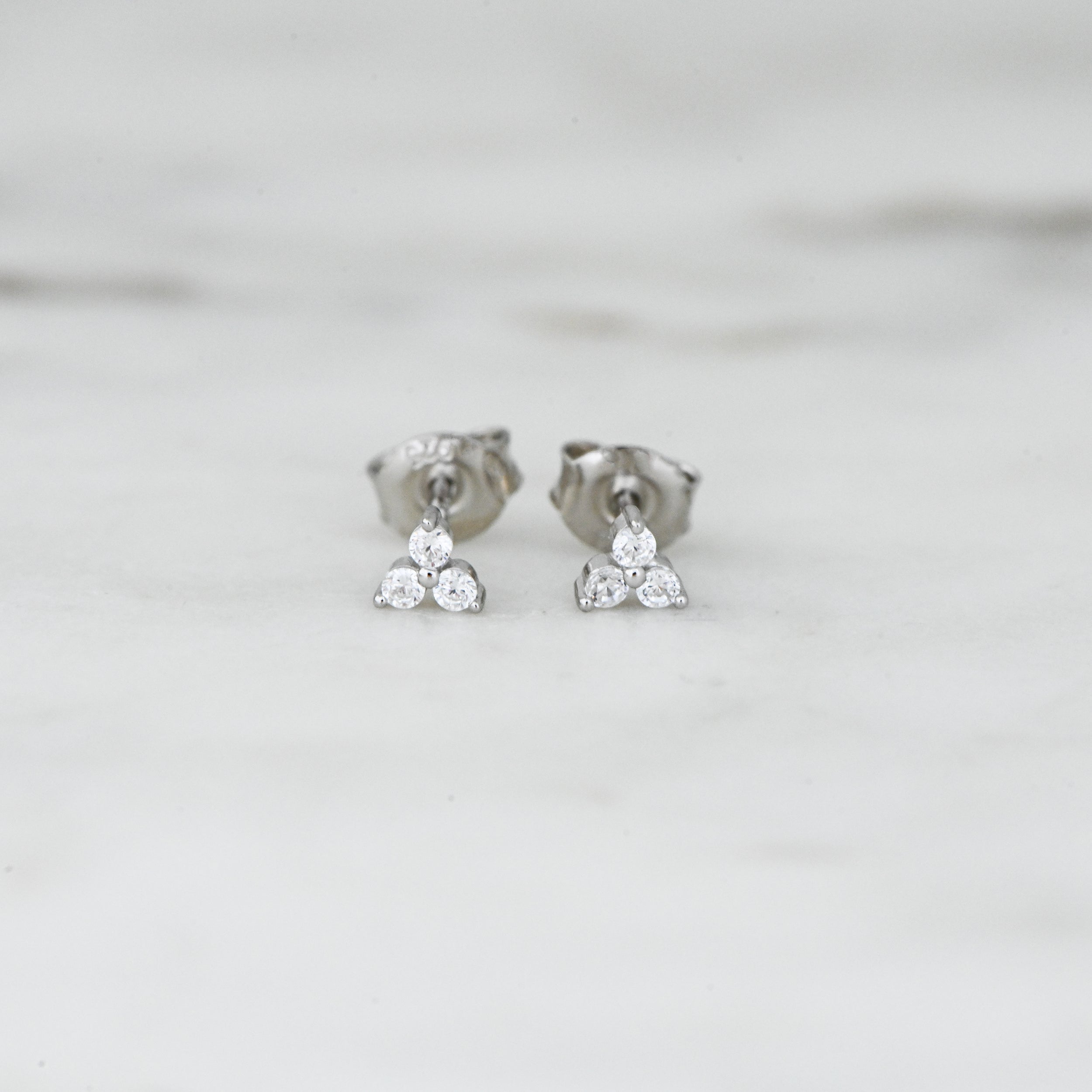 0.30 TCW Round Shape Moissanite Three Stone Stud Earrings