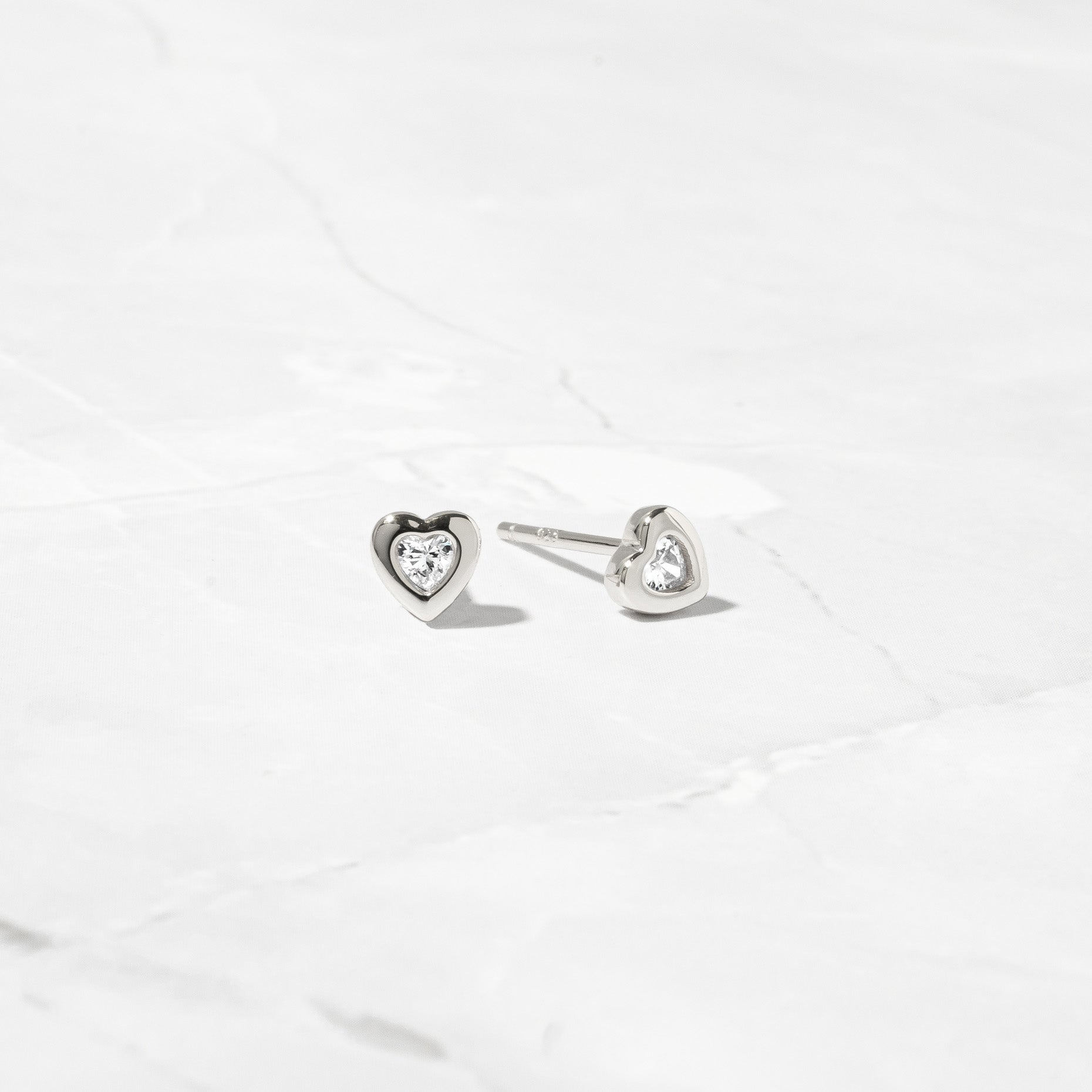 0.30 TCW Heart Shape Moissanite Solitaire Stud Earrings