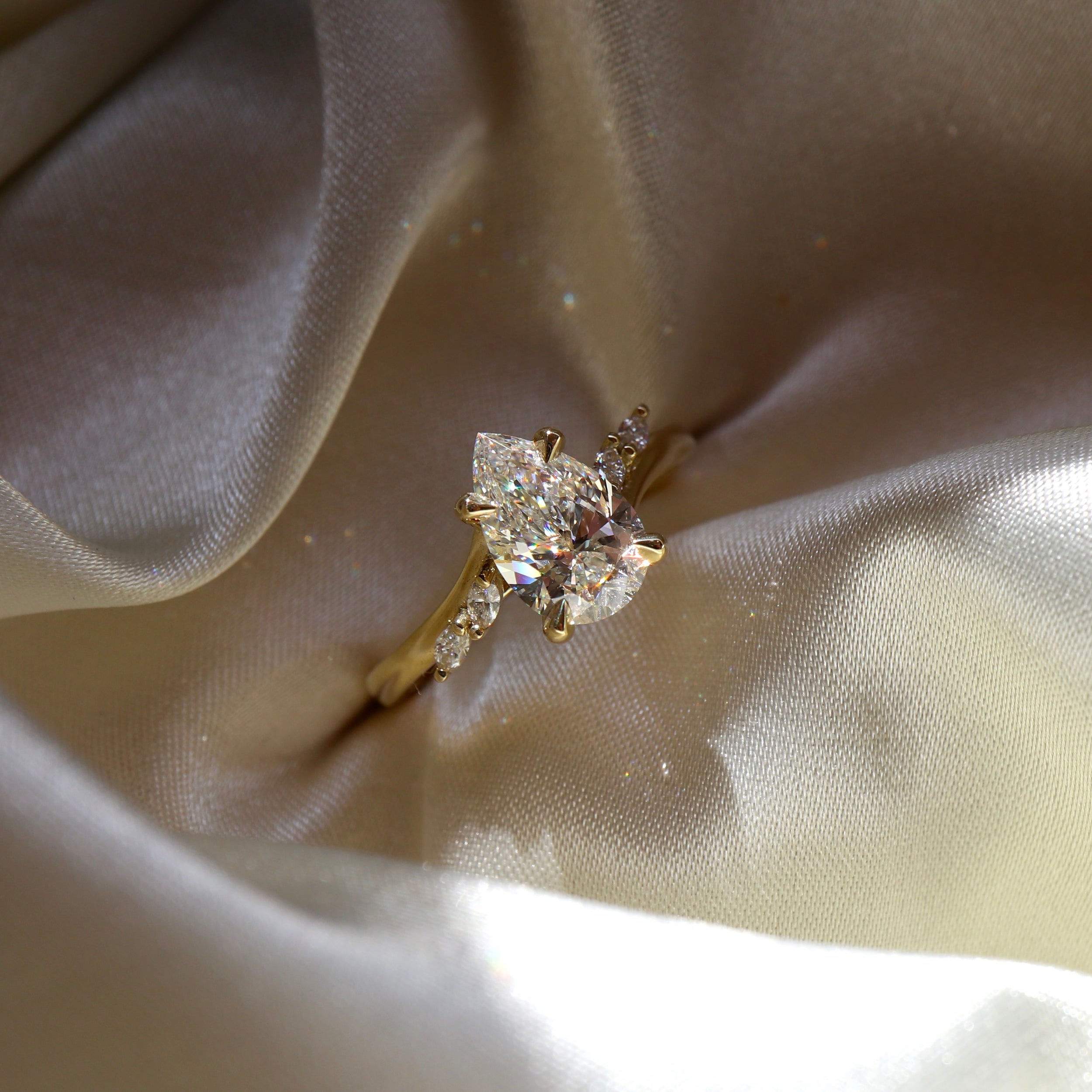 0.90 Carats Pear Shape Cluster Moissanite Engagement Ring