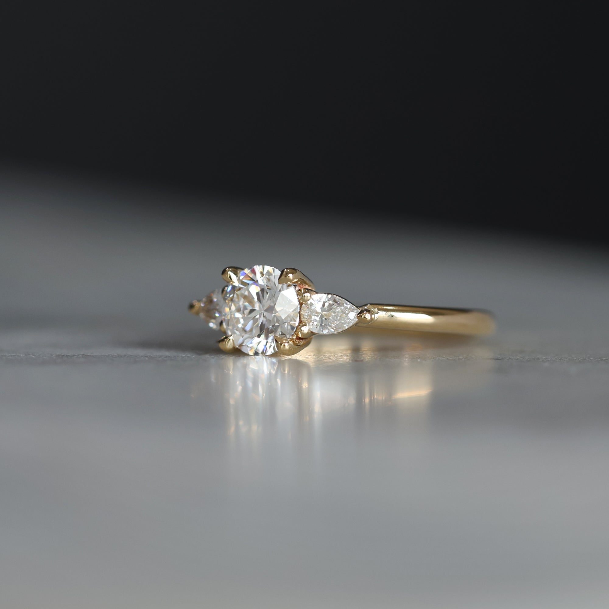 0.84 Carats Round Shape Moissanite Three Stone Engagement Ring