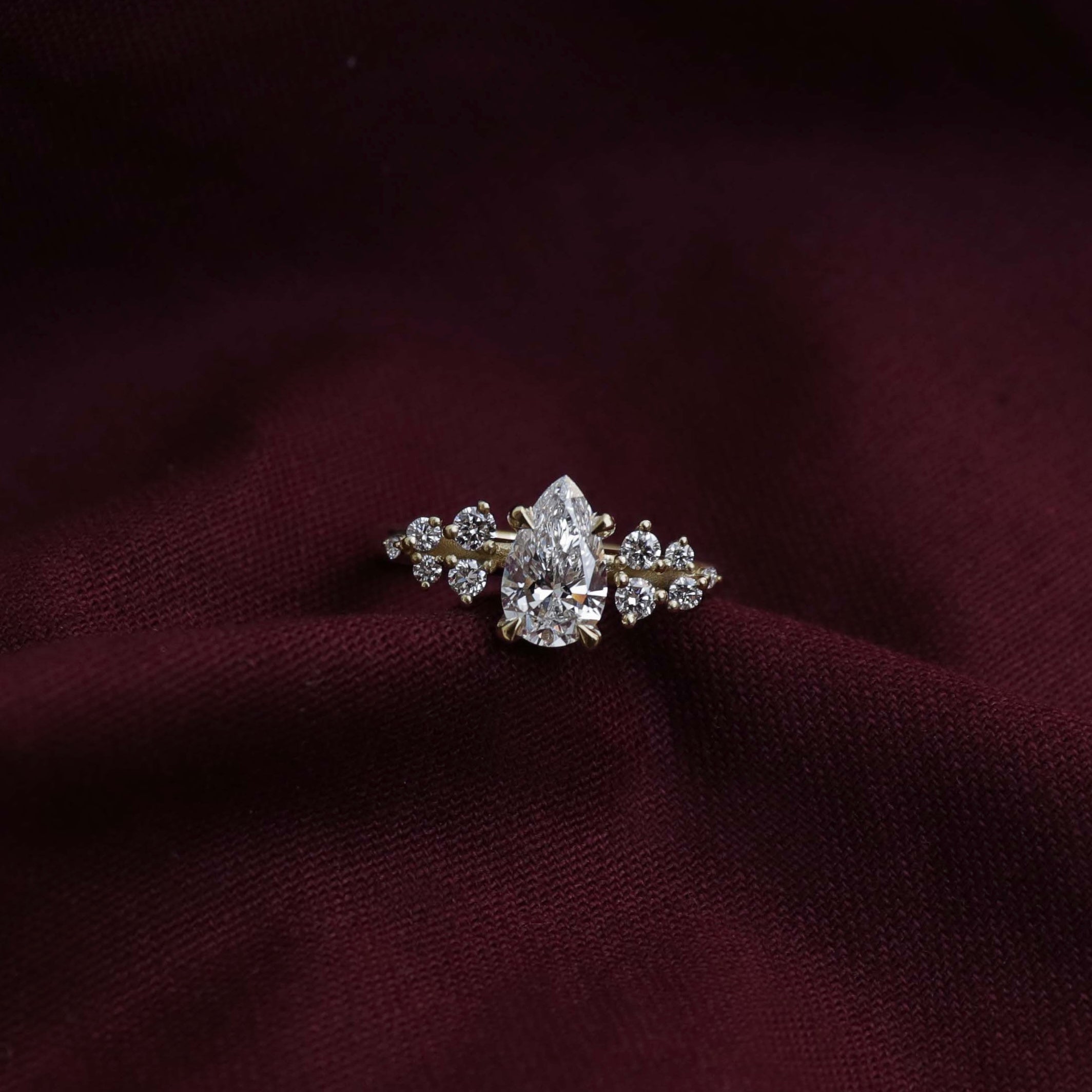 0.70 Carats Pear Shape Moissanite Cluster Engagement Ring