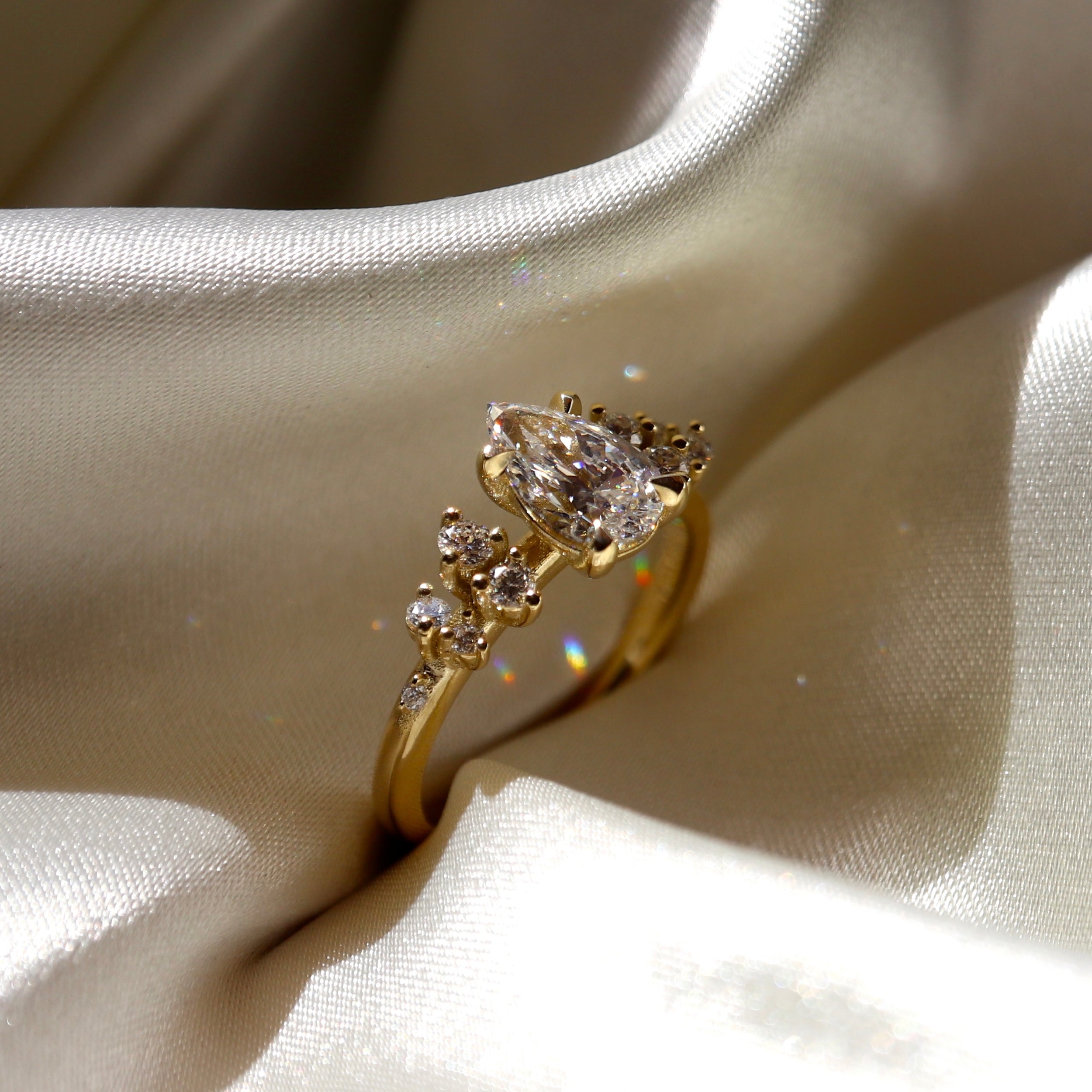 0.70 Carats Pear Shape Moissanite Cluster Engagement Ring