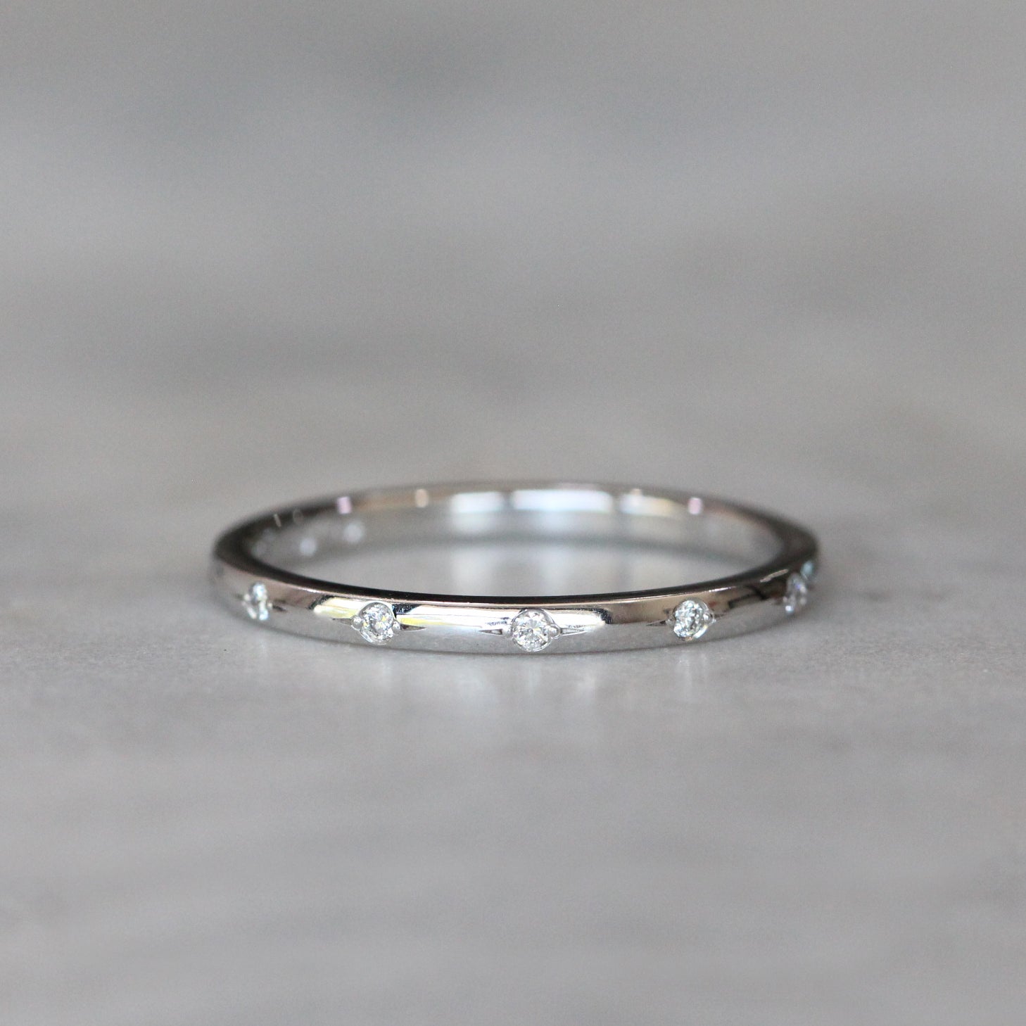 0.15 Carats Moissanite Round Shape Flush Wedding Band